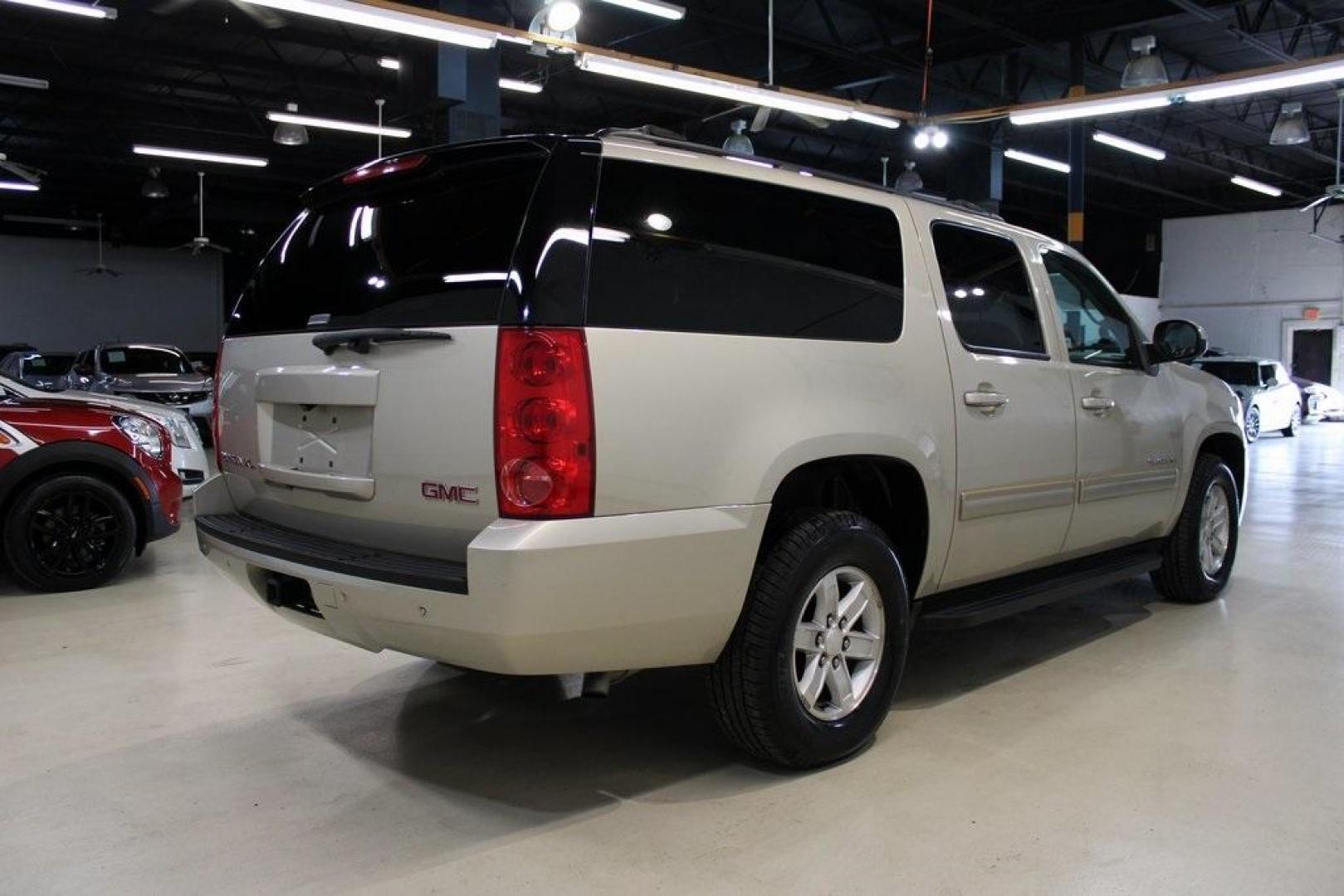 2011 Gold Mist Metallic /Ebony GMC Yukon XL SLT 1500 (1GKS1KE04BR) with an Vortec 5.3L V8 SFI Flex Fuel engine, Automatic transmission, located at 15300 Midway Rd., Addison, TX, 75001, (972) 702-0011, 32.958321, -96.838074 - HOME OF THE NO HAGGLE PRICE - WHOLESALE PRICES TO THE PUBLIC!! Yukon XL SLT 1500, 4D Sport Utility, Vortec 5.3L V8 SFI Flex Fuel, 6-Speed Automatic HD Electronic with Overdrive, RWD, Gold Mist Metallic, Ebony Leather.<br><br>Gold Mist Metallic 2011 GMC Yukon XL SLT 1500<br><br>Recent Arrival!<br><br - Photo#2