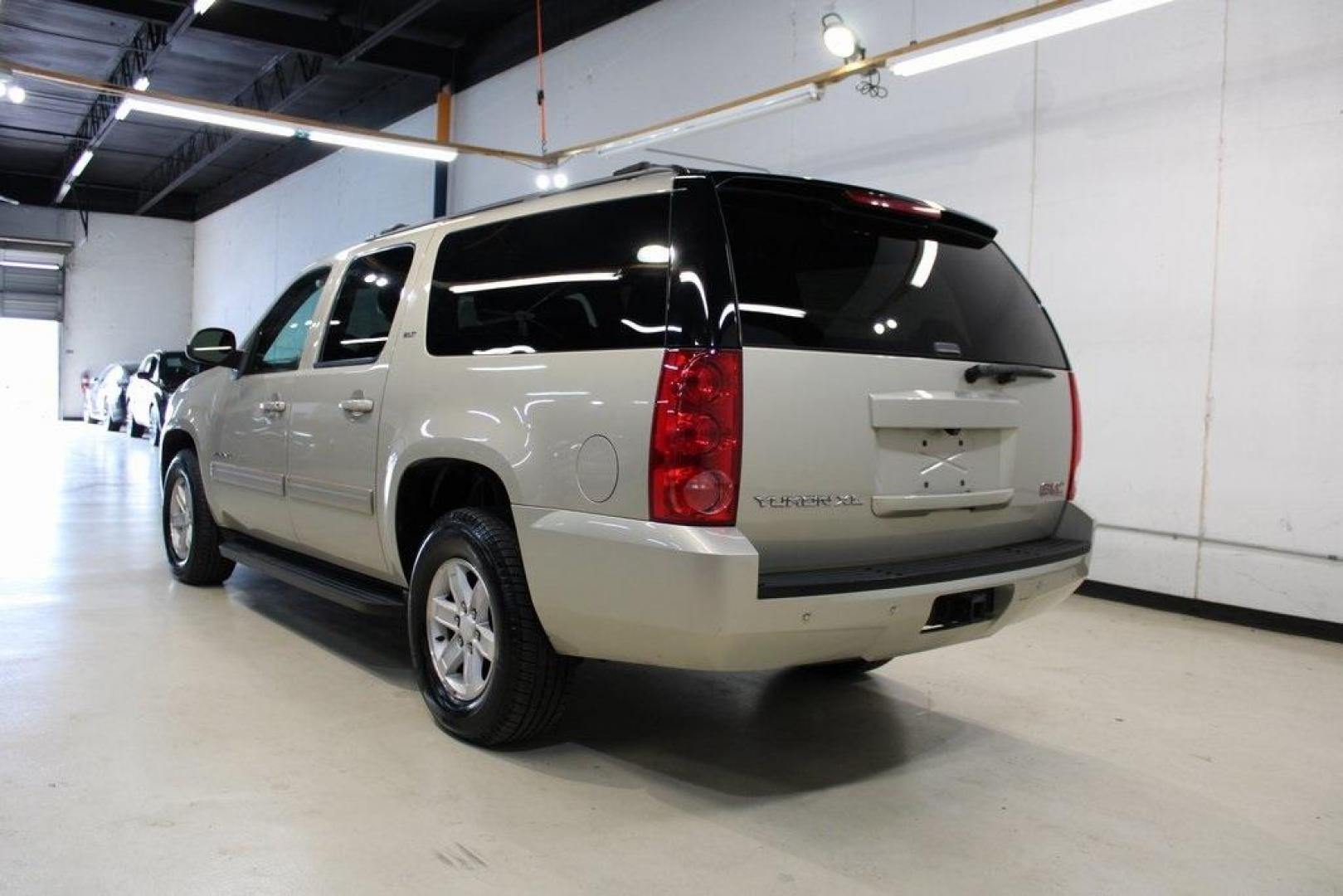 2011 Gold Mist Metallic /Ebony GMC Yukon XL SLT 1500 (1GKS1KE04BR) with an Vortec 5.3L V8 SFI Flex Fuel engine, Automatic transmission, located at 15300 Midway Rd., Addison, TX, 75001, (972) 702-0011, 32.958321, -96.838074 - HOME OF THE NO HAGGLE PRICE - WHOLESALE PRICES TO THE PUBLIC!! Yukon XL SLT 1500, 4D Sport Utility, Vortec 5.3L V8 SFI Flex Fuel, 6-Speed Automatic HD Electronic with Overdrive, RWD, Gold Mist Metallic, Ebony Leather.<br><br>Gold Mist Metallic 2011 GMC Yukon XL SLT 1500<br><br>Recent Arrival!<br><br - Photo#3