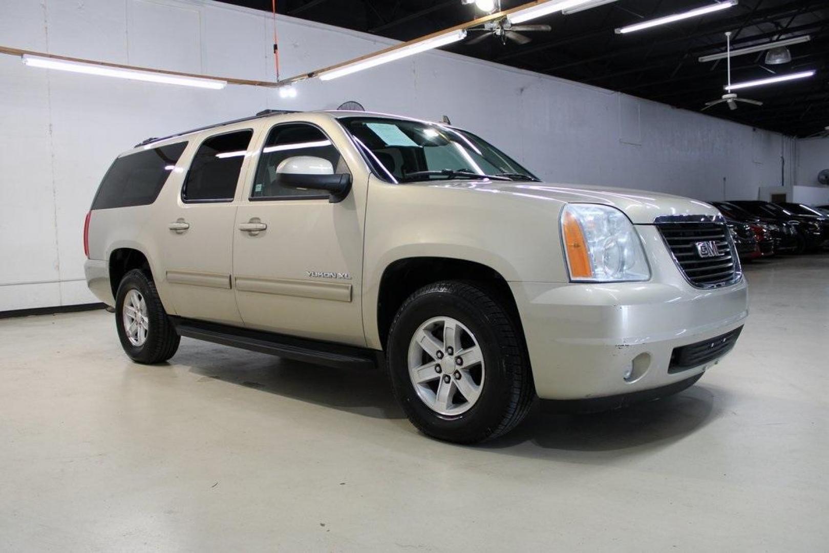 2011 Gold Mist Metallic /Ebony GMC Yukon XL SLT 1500 (1GKS1KE04BR) with an Vortec 5.3L V8 SFI Flex Fuel engine, Automatic transmission, located at 15300 Midway Rd., Addison, TX, 75001, (972) 702-0011, 32.958321, -96.838074 - HOME OF THE NO HAGGLE PRICE - WHOLESALE PRICES TO THE PUBLIC!! Yukon XL SLT 1500, 4D Sport Utility, Vortec 5.3L V8 SFI Flex Fuel, 6-Speed Automatic HD Electronic with Overdrive, RWD, Gold Mist Metallic, Ebony Leather.<br><br>Gold Mist Metallic 2011 GMC Yukon XL SLT 1500<br><br>Recent Arrival!<br><br - Photo#6