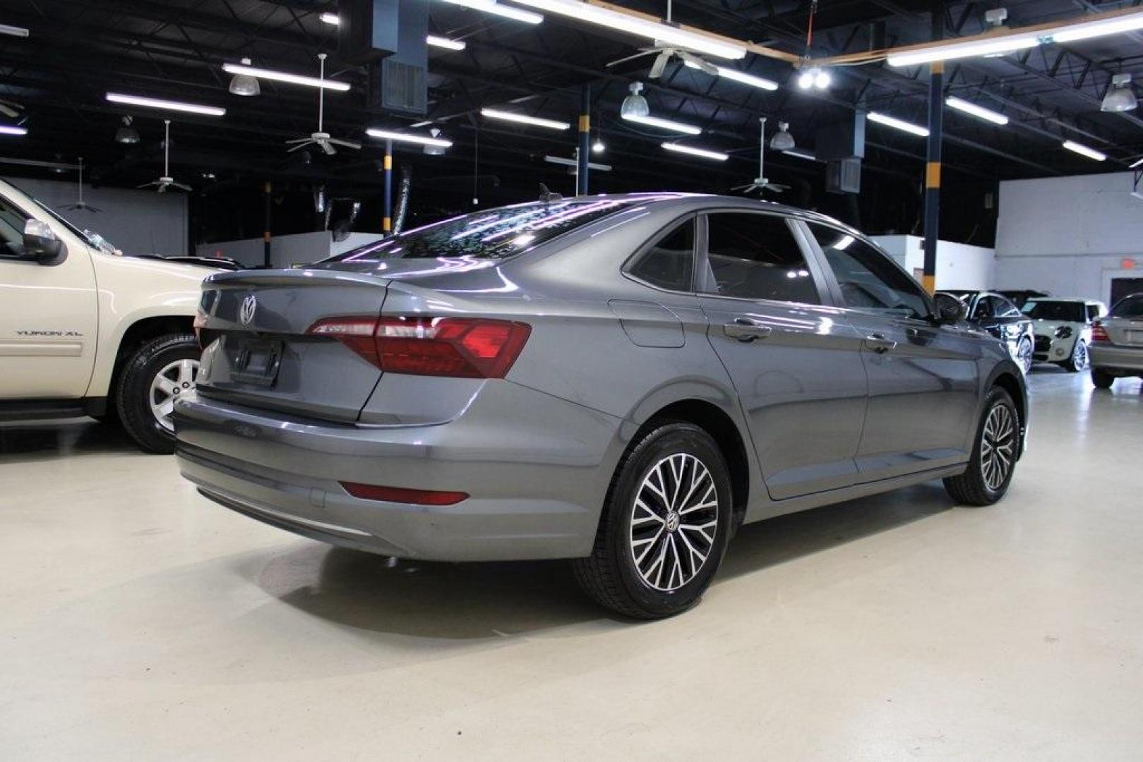 2021 Pyrite Silver Metallic /Storm Gray Volkswagen Jetta 1.4T S (3VWC57BU6MM) with an 1.4L TSI engine, Automatic transmission, located at 15300 Midway Rd., Addison, TX, 75001, (972) 702-0011, 32.958321, -96.838074 - Photo#2