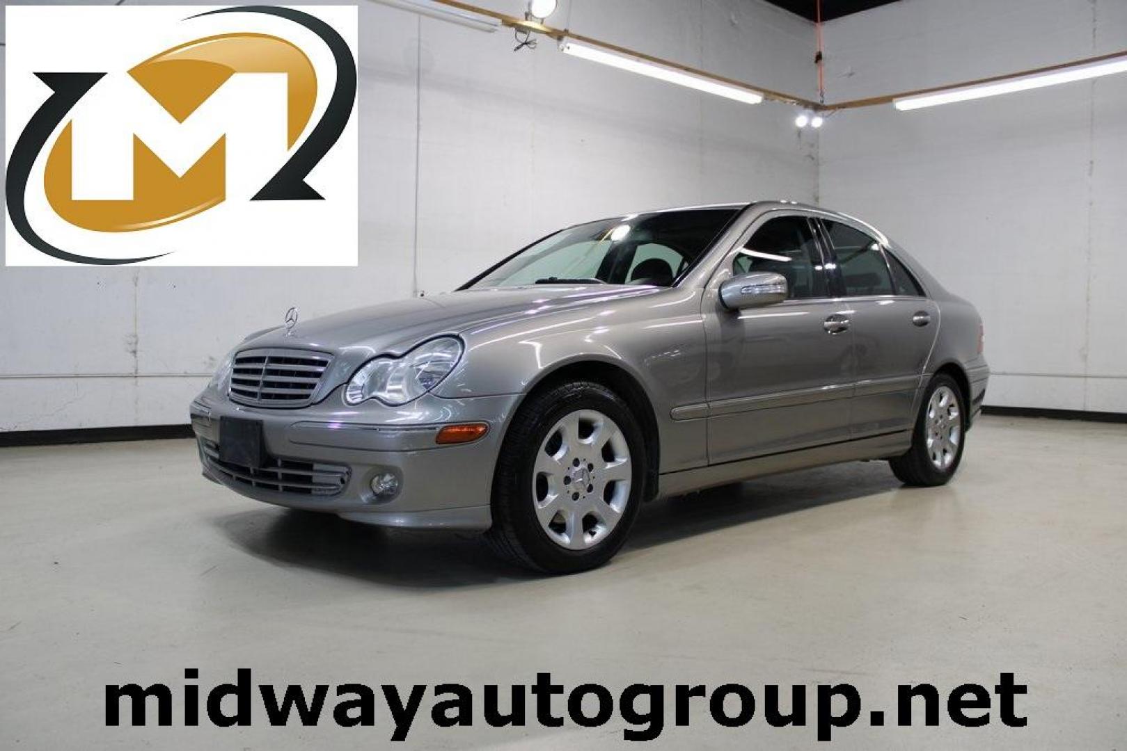 2005 Gold /Black Mercedes-Benz C-Class C 240 (WDBRF81J65F) with an 2.6L V6 SFI engine, Automatic transmission, located at 15300 Midway Rd., Addison, TX, 75001, (972) 702-0011, 32.958321, -96.838074 - HOME OF THE NO HAGGLE PRICE - WHOLESALE PRICES TO THE PUBLIC!! C 240 Luxury 4MATIC, 4D Sedan, 2.6L V6 SFI, 5-Speed Automatic with Touch Shift, 4MATIC, Gold, Black Leather.<br><br>Gold 2005 Mercedes-Benz C-Class C 240<br><br><br>At Midway Auto Group, we strive to provide you with the best quality veh - Photo#0