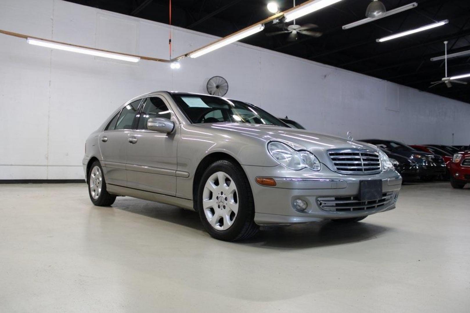 2005 Gold /Black Mercedes-Benz C-Class C 240 (WDBRF81J65F) with an 2.6L V6 SFI engine, Automatic transmission, located at 15300 Midway Rd., Addison, TX, 75001, (972) 702-0011, 32.958321, -96.838074 - HOME OF THE NO HAGGLE PRICE - WHOLESALE PRICES TO THE PUBLIC!! C 240 Luxury 4MATIC, 4D Sedan, 2.6L V6 SFI, 5-Speed Automatic with Touch Shift, 4MATIC, Gold, Black Leather.<br><br>Gold 2005 Mercedes-Benz C-Class C 240<br><br><br>At Midway Auto Group, we strive to provide you with the best quality veh - Photo#1