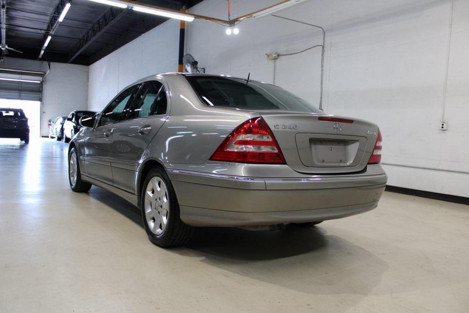 2005 Gold /Black Mercedes-Benz C-Class C 240 (WDBRF81J65F) with an 2.6L V6 SFI engine, Automatic transmission, located at 15300 Midway Rd., Addison, TX, 75001, (972) 702-0011, 32.958321, -96.838074 - HOME OF THE NO HAGGLE PRICE - WHOLESALE PRICES TO THE PUBLIC!! C 240 Luxury 4MATIC, 4D Sedan, 2.6L V6 SFI, 5-Speed Automatic with Touch Shift, 4MATIC, Gold, Black Leather.<br><br>Gold 2005 Mercedes-Benz C-Class C 240<br><br><br>At Midway Auto Group, we strive to provide you with the best quality veh - Photo#3