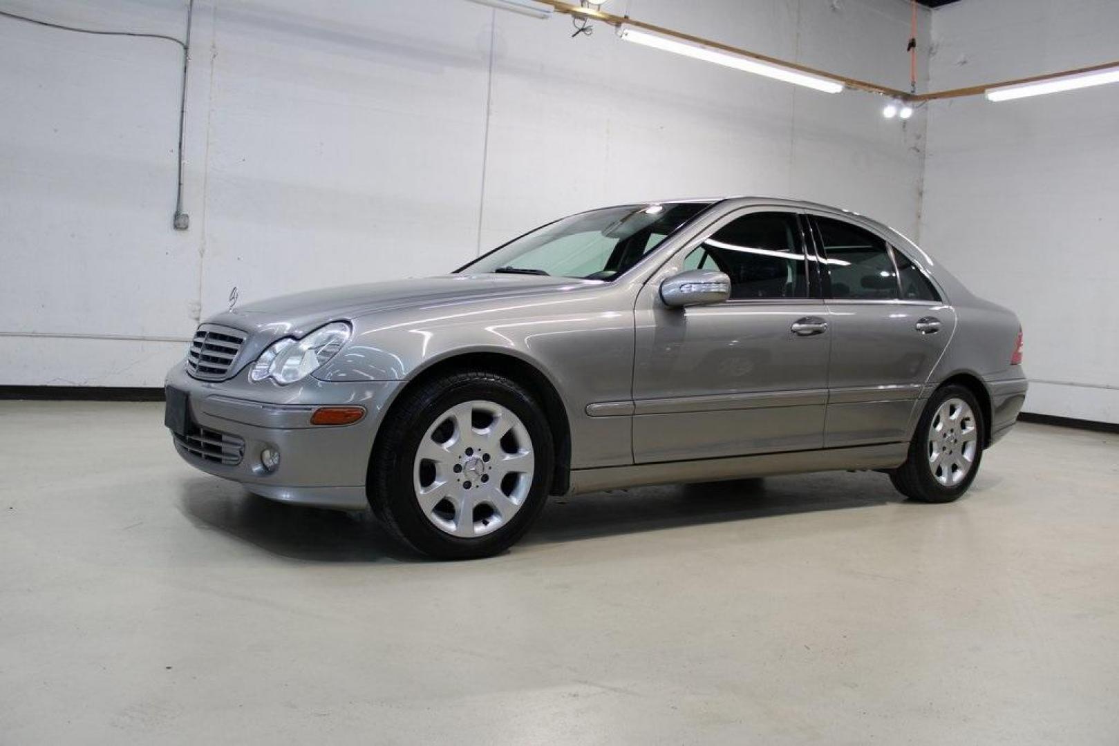 2005 Gold /Black Mercedes-Benz C-Class C 240 (WDBRF81J65F) with an 2.6L V6 SFI engine, Automatic transmission, located at 15300 Midway Rd., Addison, TX, 75001, (972) 702-0011, 32.958321, -96.838074 - HOME OF THE NO HAGGLE PRICE - WHOLESALE PRICES TO THE PUBLIC!! C 240 Luxury 4MATIC, 4D Sedan, 2.6L V6 SFI, 5-Speed Automatic with Touch Shift, 4MATIC, Gold, Black Leather.<br><br>Gold 2005 Mercedes-Benz C-Class C 240<br><br><br>At Midway Auto Group, we strive to provide you with the best quality veh - Photo#4