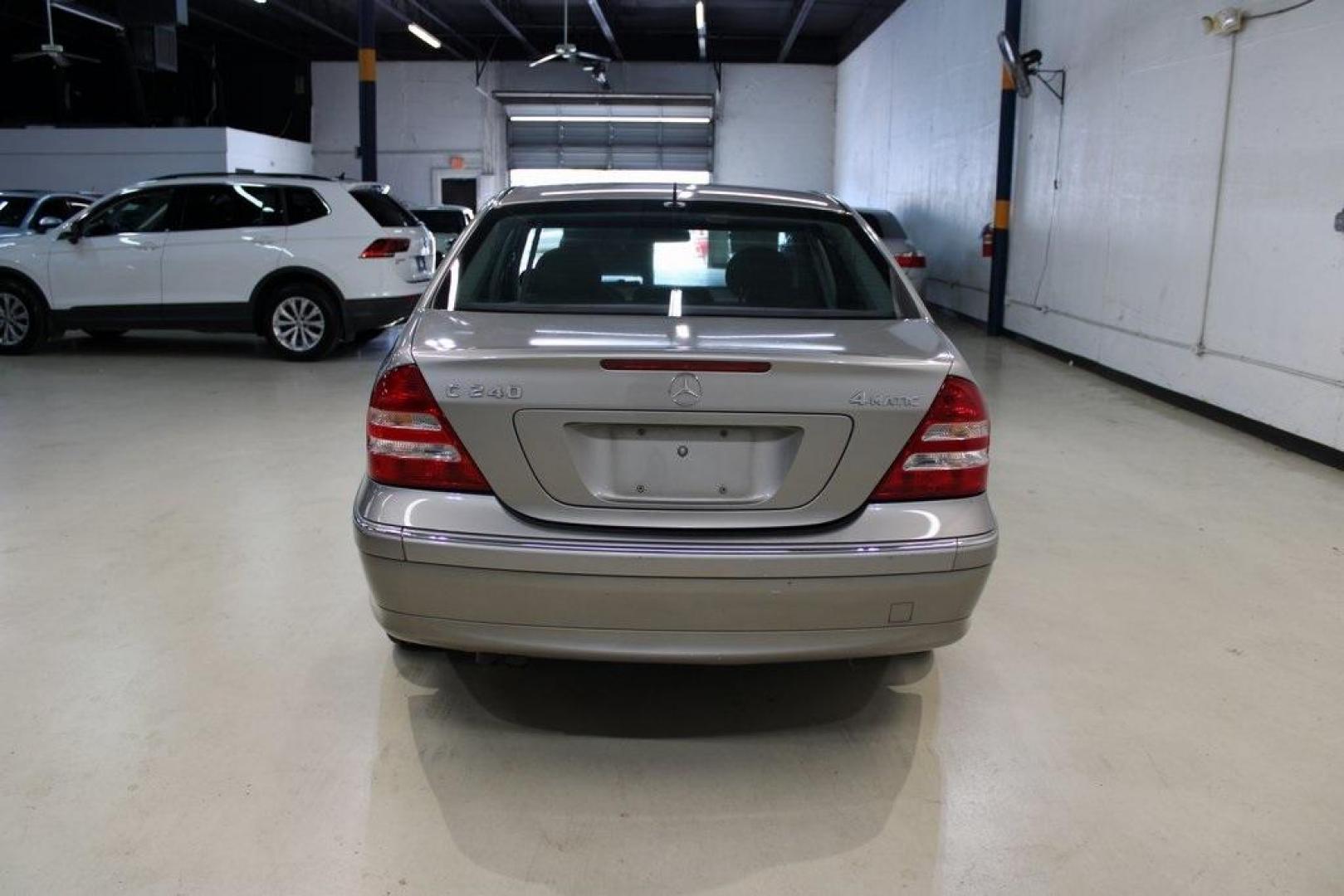 2005 Gold /Black Mercedes-Benz C-Class C 240 (WDBRF81J65F) with an 2.6L V6 SFI engine, Automatic transmission, located at 15300 Midway Rd., Addison, TX, 75001, (972) 702-0011, 32.958321, -96.838074 - HOME OF THE NO HAGGLE PRICE - WHOLESALE PRICES TO THE PUBLIC!! C 240 Luxury 4MATIC, 4D Sedan, 2.6L V6 SFI, 5-Speed Automatic with Touch Shift, 4MATIC, Gold, Black Leather.<br><br>Gold 2005 Mercedes-Benz C-Class C 240<br><br><br>At Midway Auto Group, we strive to provide you with the best quality veh - Photo#7