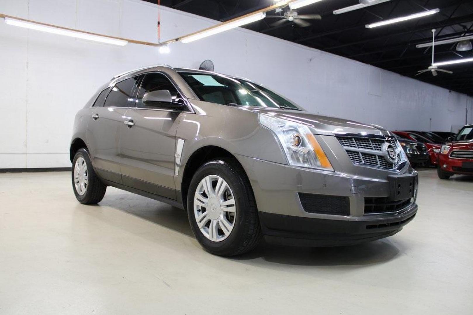 2011 Mocha Steel Metallic /Shale W/Brownstone Accents Cadillac SRX Luxury (3GYFNAEY6BS) with an 3.0L V6 SIDI DOHC VVT engine, Automatic transmission, located at 15300 Midway Rd., Addison, TX, 75001, (972) 702-0011, 32.958321, -96.838074 - HOME OF THE NO HAGGLE PRICE - WHOLESALE PRICES TO THE PUBLIC!! SRX Luxury, 4D Sport Utility, 3.0L V6 SIDI DOHC VVT, 6-Speed Automatic, FWD, Mocha Steel Metallic, Shale W/Brownstone Accents Leather.<br><br>Mocha Steel Metallic 2011 Cadillac SRX Luxury<br><br><br>Awards:<br> * 2011 IIHS Top Safety Pi - Photo#1