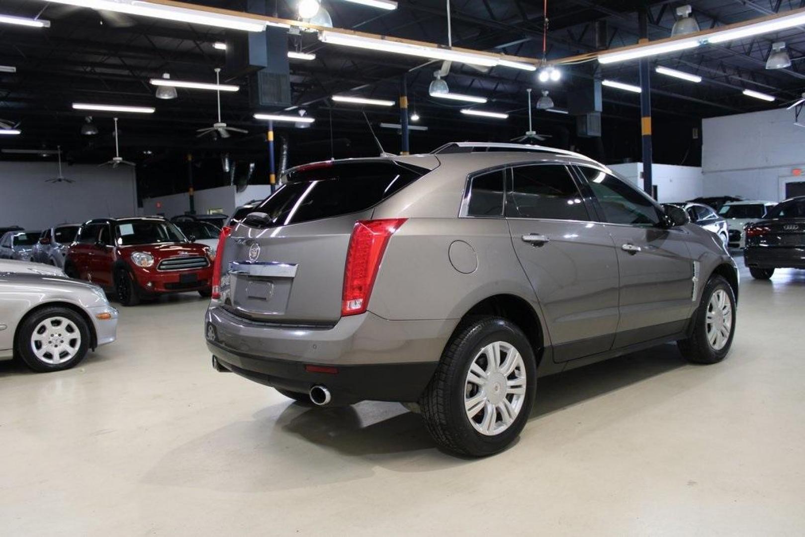 2011 Mocha Steel Metallic /Shale W/Brownstone Accents Cadillac SRX Luxury (3GYFNAEY6BS) with an 3.0L V6 SIDI DOHC VVT engine, Automatic transmission, located at 15300 Midway Rd., Addison, TX, 75001, (972) 702-0011, 32.958321, -96.838074 - HOME OF THE NO HAGGLE PRICE - WHOLESALE PRICES TO THE PUBLIC!! SRX Luxury, 4D Sport Utility, 3.0L V6 SIDI DOHC VVT, 6-Speed Automatic, FWD, Mocha Steel Metallic, Shale W/Brownstone Accents Leather.<br><br>Mocha Steel Metallic 2011 Cadillac SRX Luxury<br><br><br>Awards:<br> * 2011 IIHS Top Safety Pi - Photo#2