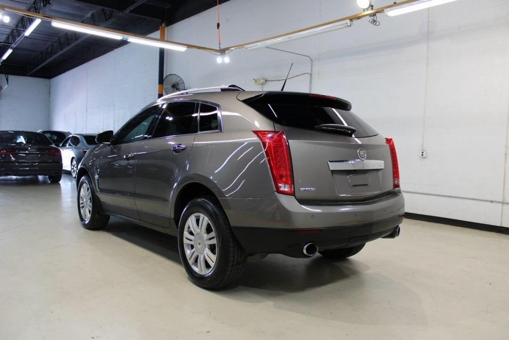 2011 Mocha Steel Metallic /Shale W/Brownstone Accents Cadillac SRX Luxury (3GYFNAEY6BS) with an 3.0L V6 SIDI DOHC VVT engine, Automatic transmission, located at 15300 Midway Rd., Addison, TX, 75001, (972) 702-0011, 32.958321, -96.838074 - HOME OF THE NO HAGGLE PRICE - WHOLESALE PRICES TO THE PUBLIC!! SRX Luxury, 4D Sport Utility, 3.0L V6 SIDI DOHC VVT, 6-Speed Automatic, FWD, Mocha Steel Metallic, Shale W/Brownstone Accents Leather.<br><br>Mocha Steel Metallic 2011 Cadillac SRX Luxury<br><br><br>Awards:<br> * 2011 IIHS Top Safety Pi - Photo#3