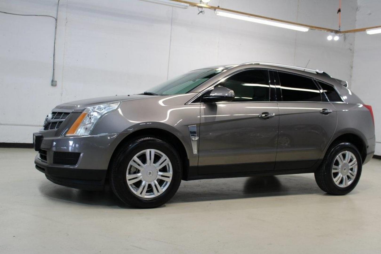 2011 Mocha Steel Metallic /Shale W/Brownstone Accents Cadillac SRX Luxury (3GYFNAEY6BS) with an 3.0L V6 SIDI DOHC VVT engine, Automatic transmission, located at 15300 Midway Rd., Addison, TX, 75001, (972) 702-0011, 32.958321, -96.838074 - HOME OF THE NO HAGGLE PRICE - WHOLESALE PRICES TO THE PUBLIC!! SRX Luxury, 4D Sport Utility, 3.0L V6 SIDI DOHC VVT, 6-Speed Automatic, FWD, Mocha Steel Metallic, Shale W/Brownstone Accents Leather.<br><br>Mocha Steel Metallic 2011 Cadillac SRX Luxury<br><br><br>Awards:<br> * 2011 IIHS Top Safety Pi - Photo#4