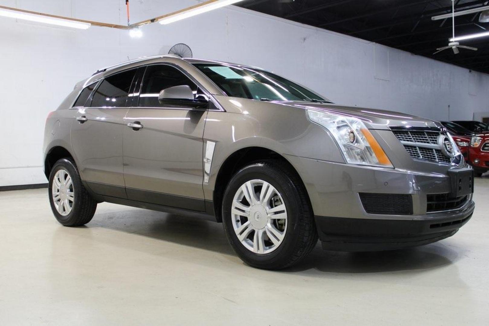 2011 Mocha Steel Metallic /Shale W/Brownstone Accents Cadillac SRX Luxury (3GYFNAEY6BS) with an 3.0L V6 SIDI DOHC VVT engine, Automatic transmission, located at 15300 Midway Rd., Addison, TX, 75001, (972) 702-0011, 32.958321, -96.838074 - HOME OF THE NO HAGGLE PRICE - WHOLESALE PRICES TO THE PUBLIC!! SRX Luxury, 4D Sport Utility, 3.0L V6 SIDI DOHC VVT, 6-Speed Automatic, FWD, Mocha Steel Metallic, Shale W/Brownstone Accents Leather.<br><br>Mocha Steel Metallic 2011 Cadillac SRX Luxury<br><br><br>Awards:<br> * 2011 IIHS Top Safety Pi - Photo#6