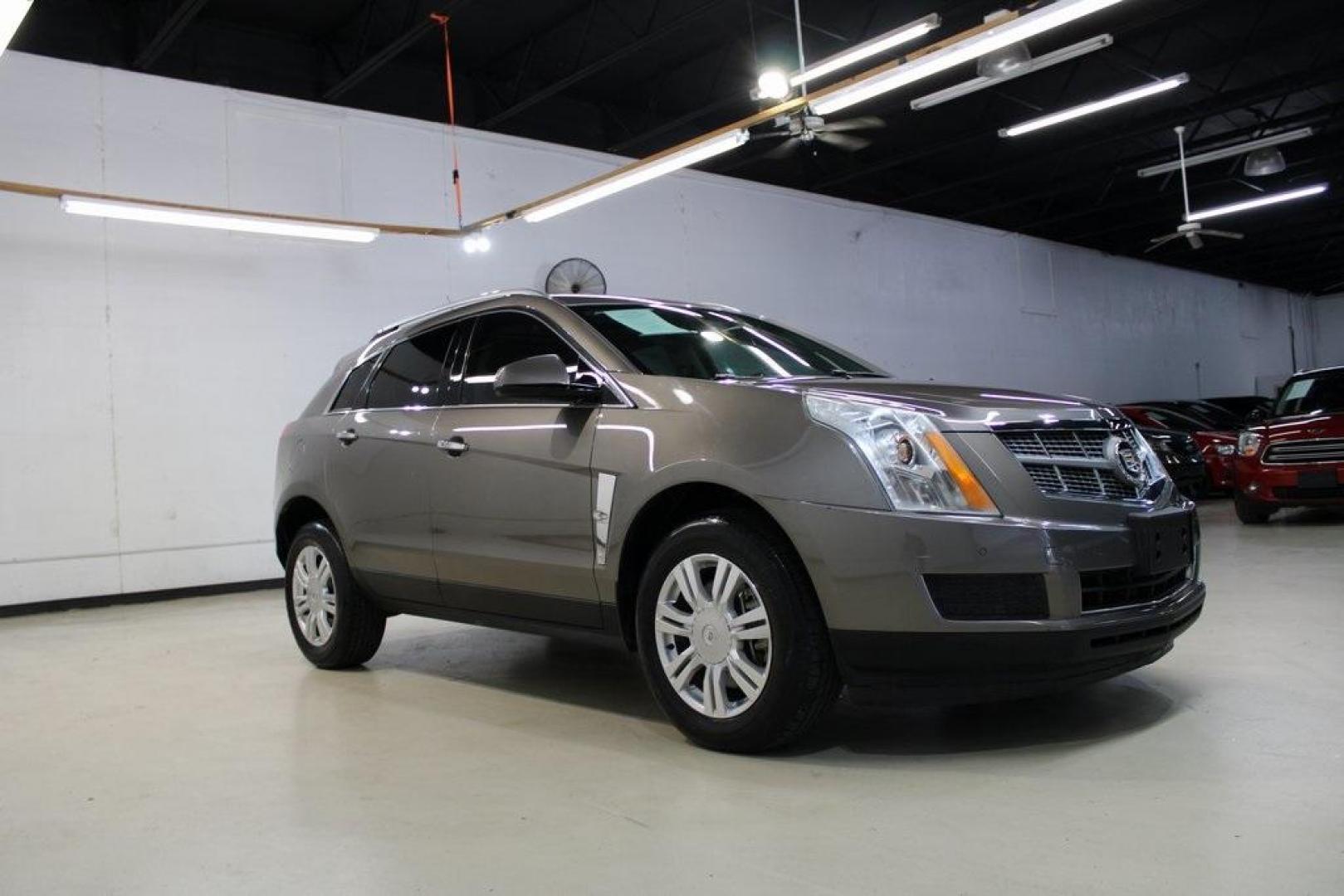 2011 Mocha Steel Metallic /Shale W/Brownstone Accents Cadillac SRX Luxury (3GYFNAEY6BS) with an 3.0L V6 SIDI DOHC VVT engine, Automatic transmission, located at 15300 Midway Rd., Addison, TX, 75001, (972) 702-0011, 32.958321, -96.838074 - HOME OF THE NO HAGGLE PRICE - WHOLESALE PRICES TO THE PUBLIC!! SRX Luxury, 4D Sport Utility, 3.0L V6 SIDI DOHC VVT, 6-Speed Automatic, FWD, Mocha Steel Metallic, Shale W/Brownstone Accents Leather.<br><br>Mocha Steel Metallic 2011 Cadillac SRX Luxury<br><br><br>Awards:<br> * 2011 IIHS Top Safety Pi - Photo#7