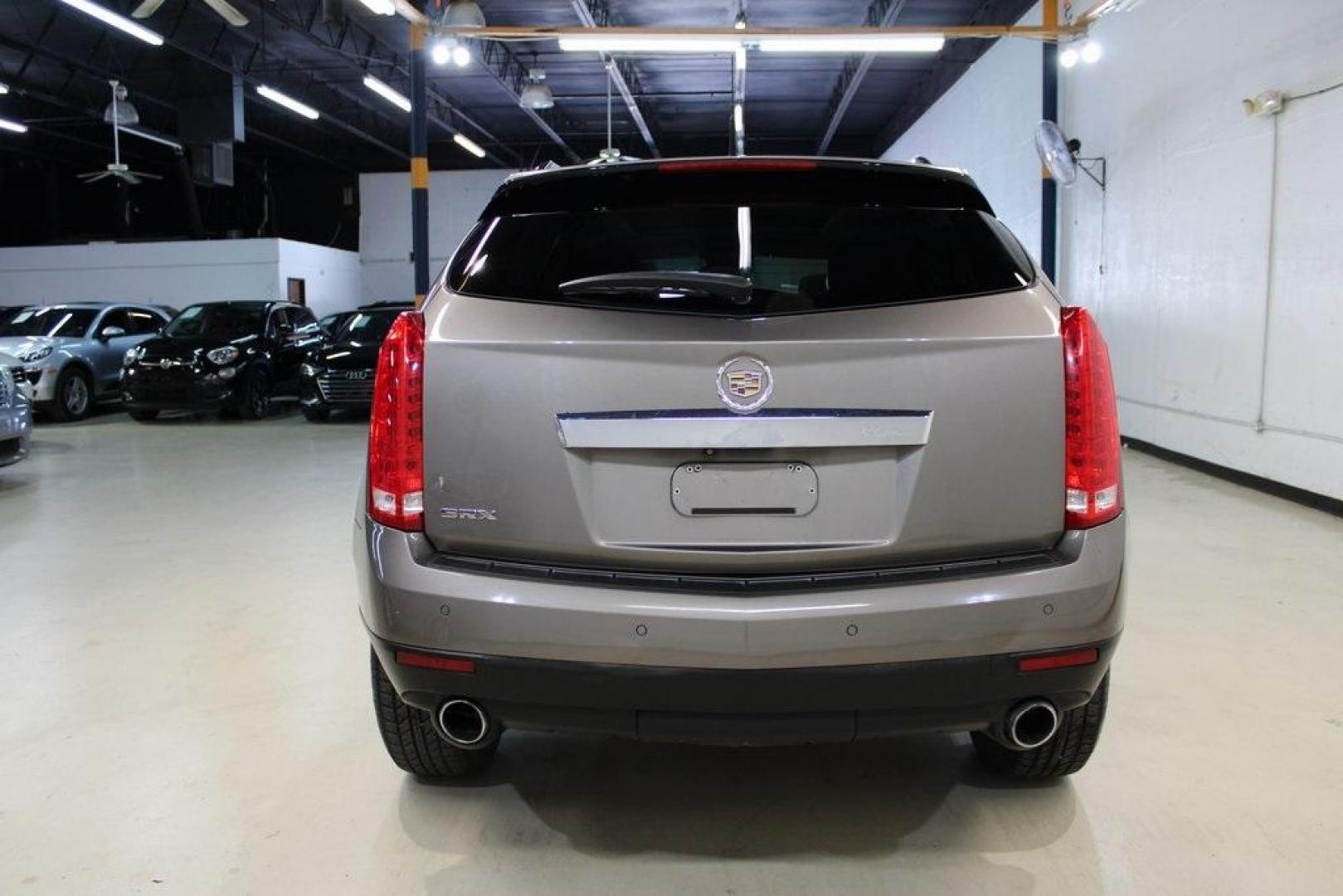 2011 Mocha Steel Metallic /Shale W/Brownstone Accents Cadillac SRX Luxury (3GYFNAEY6BS) with an 3.0L V6 SIDI DOHC VVT engine, Automatic transmission, located at 15300 Midway Rd., Addison, TX, 75001, (972) 702-0011, 32.958321, -96.838074 - HOME OF THE NO HAGGLE PRICE - WHOLESALE PRICES TO THE PUBLIC!! SRX Luxury, 4D Sport Utility, 3.0L V6 SIDI DOHC VVT, 6-Speed Automatic, FWD, Mocha Steel Metallic, Shale W/Brownstone Accents Leather.<br><br>Mocha Steel Metallic 2011 Cadillac SRX Luxury<br><br><br>Awards:<br> * 2011 IIHS Top Safety Pi - Photo#8