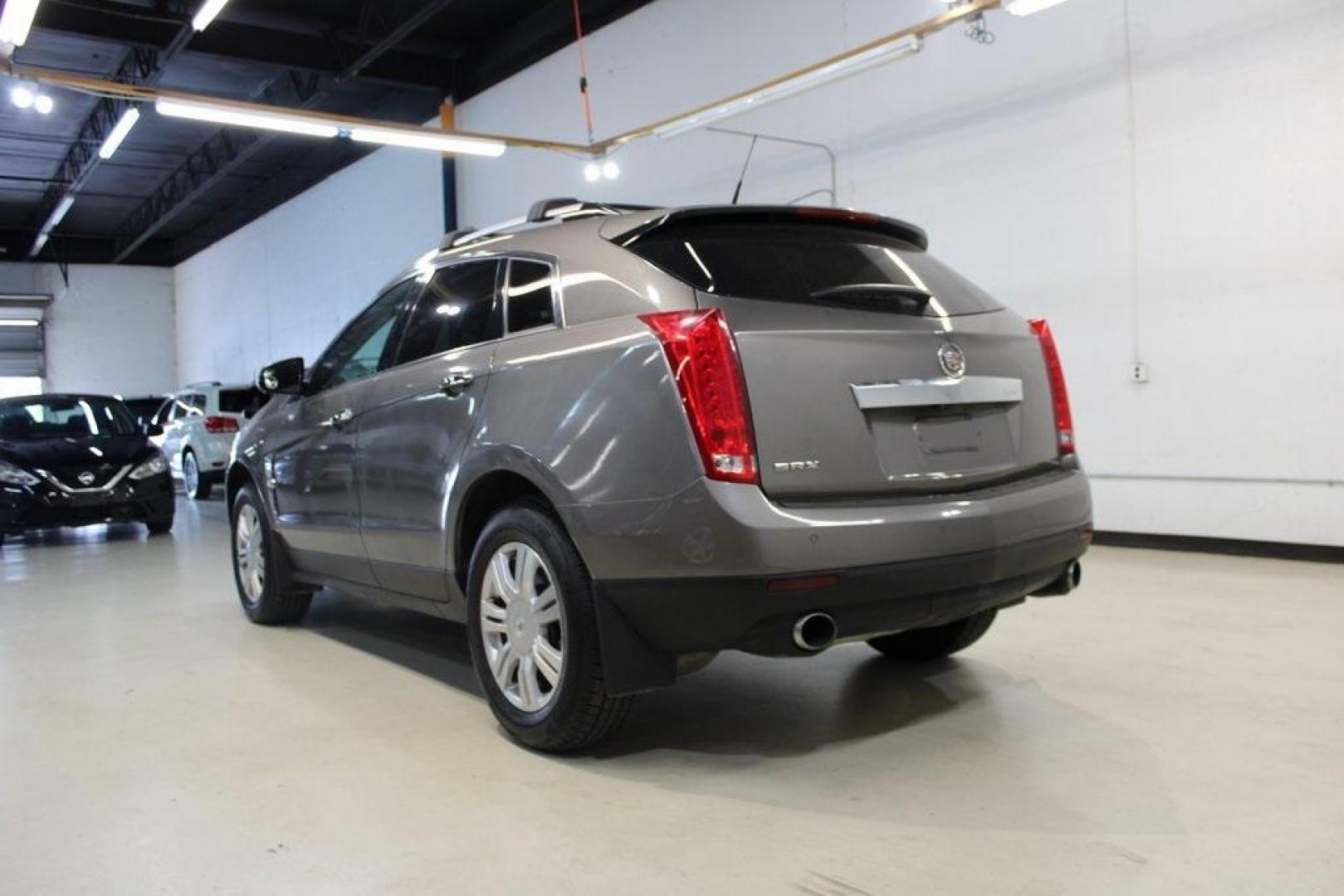 2011 Mocha Steel Metallic /Shale W/Brownstone Accents Cadillac SRX Luxury (3GYFNAEY8BS) with an 3.0L V6 SIDI DOHC VVT engine, Automatic transmission, located at 15300 Midway Rd., Addison, TX, 75001, (972) 702-0011, 32.958321, -96.838074 - Photo#3