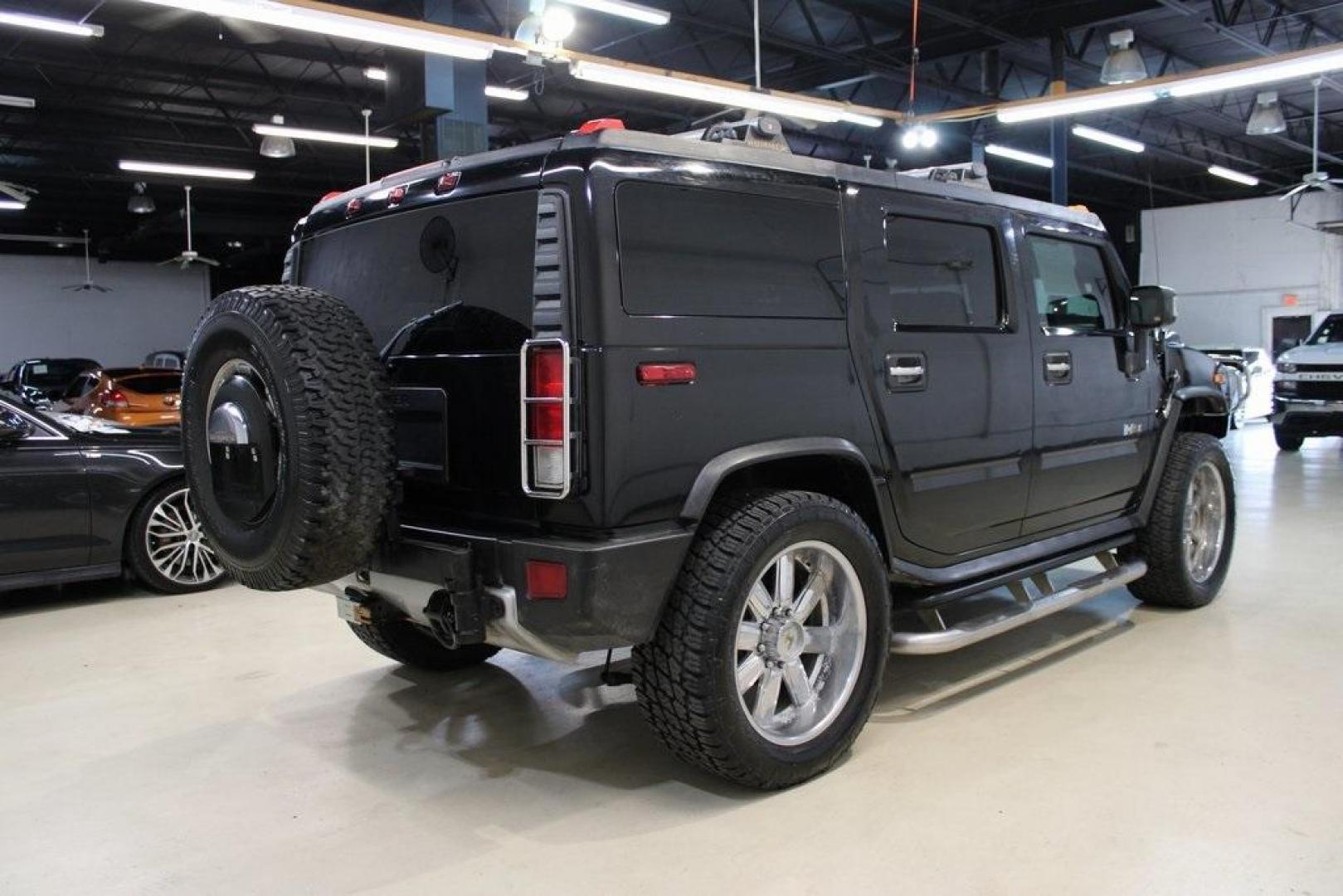 2008 Black /Ebony Hummer H2 Base (5GRGN238X8H) with an Vortec 6.2L V8 SFI engine, Automatic transmission, located at 15300 Midway Rd., Addison, TX, 75001, (972) 702-0011, 32.958321, -96.838074 - HOME OF THE NO HAGGLE PRICE - WHOLESALE PRICES TO THE PUBLIC!! 4D Sport Utility, Vortec 6.2L V8 SFI, 6-Speed Automatic HD Electronic with Overdrive, 4WD, Black, Ebony Leather.<br><br>Black 2008 Hummer H2<br><br>Recent Arrival!<br><br><br>At Midway Auto Group, we strive to provide you with the best q - Photo#2