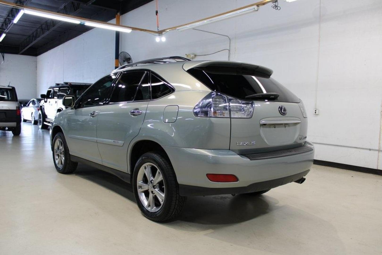 2008 Gold /Ivory Lexus RX 400h (JTJHW31U882) with an 3.3L V6 VVT-i engine, CVT transmission, located at 15300 Midway Rd., Addison, TX, 75001, (972) 702-0011, 32.958321, -96.838074 - HOME OF THE NO HAGGLE PRICE - WHOLESALE PRICES TO THE PUBLIC!! RX 400h, 4D Sport Utility, 3.3L V6 VVT-i, eCVT, AWD, Gold, Ivory w/Fabric Seat Trim.<br><br>Gold 2008 Lexus RX 400h<br><br><br>Awards:<br> * 2008 KBB.com Brand Image Awards<br><br>At Midway Auto Group, we strive to provide you with the - Photo#3