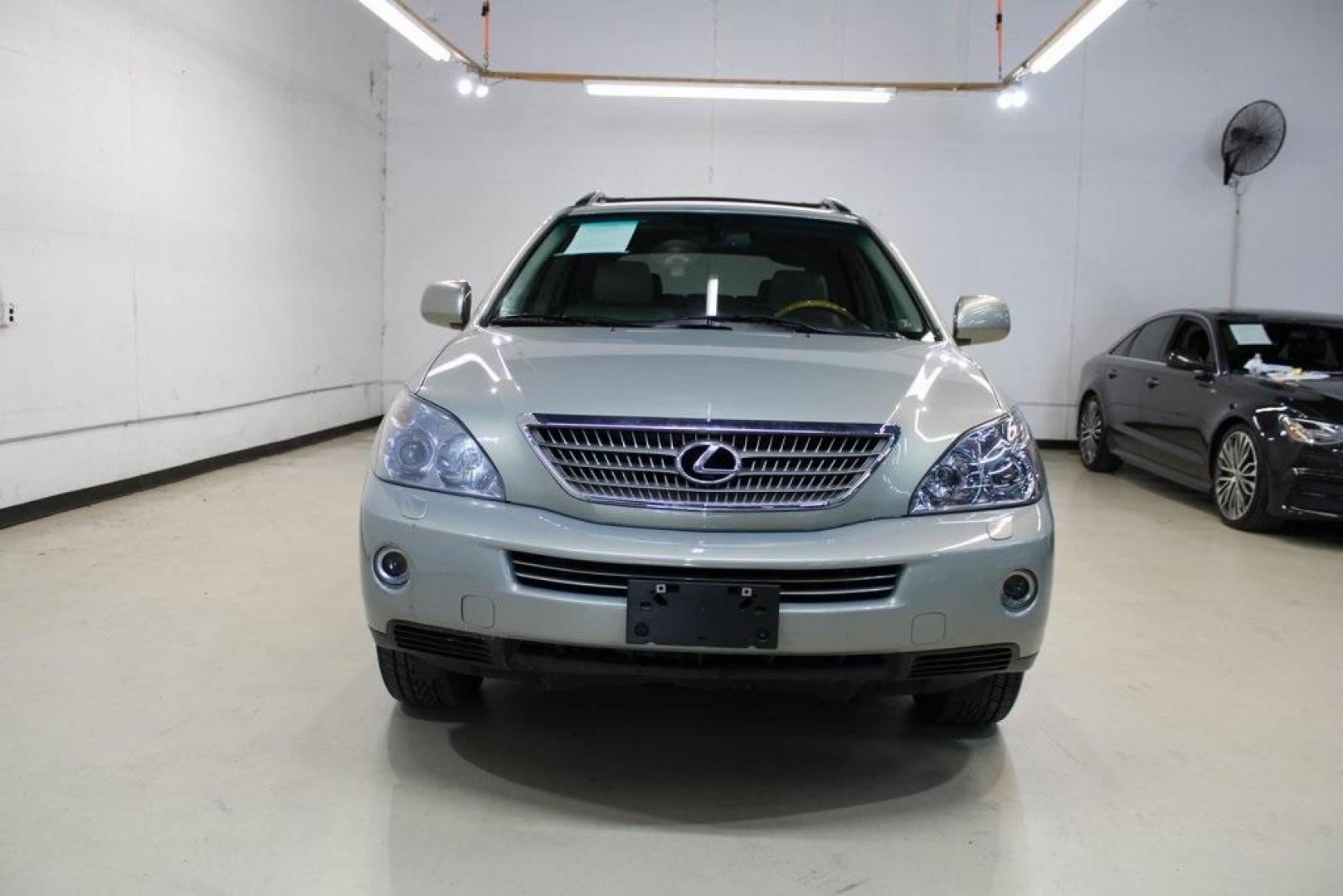 2008 Gold /Ivory Lexus RX 400h (JTJHW31U882) with an 3.3L V6 VVT-i engine, CVT transmission, located at 15300 Midway Rd., Addison, TX, 75001, (972) 702-0011, 32.958321, -96.838074 - HOME OF THE NO HAGGLE PRICE - WHOLESALE PRICES TO THE PUBLIC!! RX 400h, 4D Sport Utility, 3.3L V6 VVT-i, eCVT, AWD, Gold, Ivory w/Fabric Seat Trim.<br><br>Gold 2008 Lexus RX 400h<br><br><br>Awards:<br> * 2008 KBB.com Brand Image Awards<br><br>At Midway Auto Group, we strive to provide you with the - Photo#5