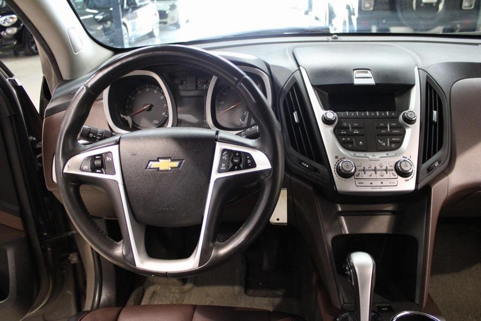 2011 Mocha Steel Metallic /Brownstone/Jet Black Chevrolet Equinox LT (2CNALPEC0B6) with an 2.4L 4-Cylinder SIDI DOHC engine, Automatic transmission, located at 15300 Midway Rd., Addison, TX, 75001, (972) 702-0011, 32.958321, -96.838074 - HOME OF THE NO HAGGLE PRICE - WHOLESALE PRICES TO THE PUBLIC!! Equinox LT 2LT, 4D Sport Utility, 2.4L 4-Cylinder SIDI DOHC, 6-Speed Automatic with Overdrive, FWD, Mocha Steel Metallic, Brownstone/Jet Black Leather.<br><br>Mocha Steel Metallic 2011 Chevrolet Equinox LT<br><br>Recent Arrival! 22/32 Ci - Photo#16