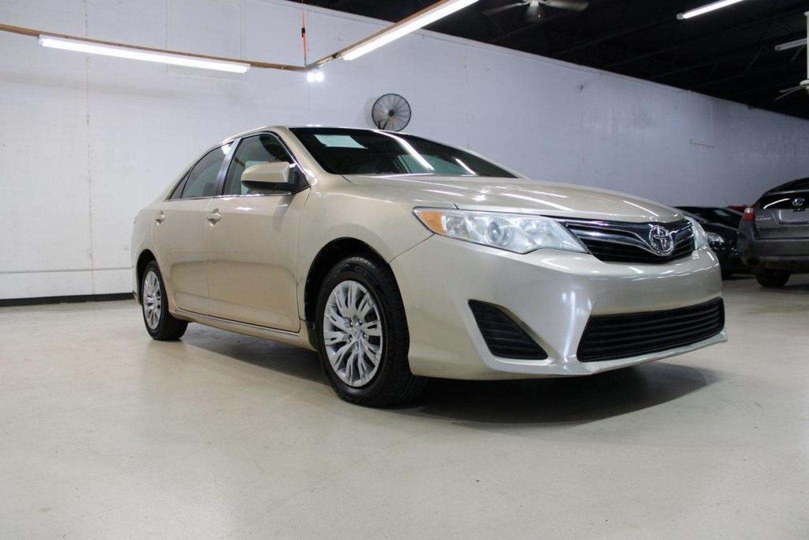 2012 Begie /Begie Toyota Camry LE (4T1BF1FK3CU) with an 2.5L I4 SMPI DOHC engine, Automatic transmission, located at 15300 Midway Rd., Addison, TX, 75001, (972) 702-0011, 32.958321, -96.838074 - HOME OF THE NO HAGGLE PRICE - WHOLESALE PRICES TO THE PUBLIC!! Camry LE, 4D Sedan, 2.5L I4 SMPI DOHC, 6-Speed Automatic, FWD, Begie, Begie Cloth. Odometer is 12022 miles below market average!<br><br>Begie 2012 Toyota Camry LE<br><br>25/35 City/Highway MPG<br><br>Awards:<br> * 2012 KBB.com Best Resa - Photo#1