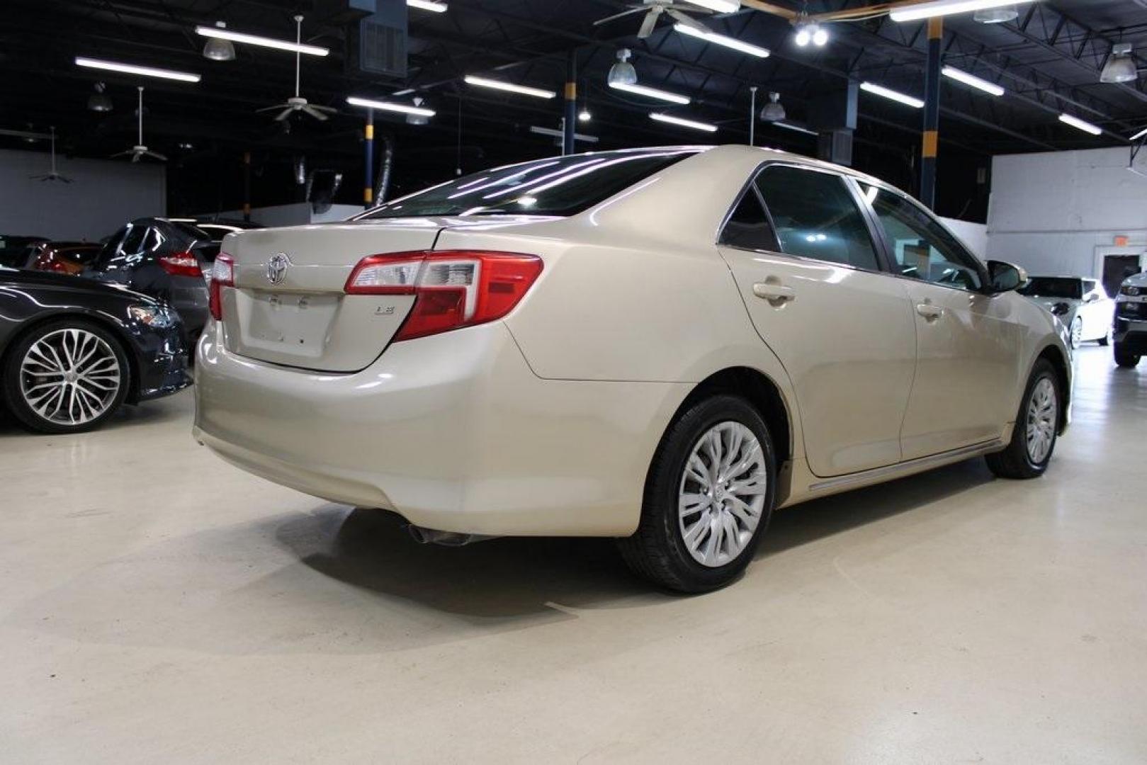 2012 Begie /Begie Toyota Camry LE (4T1BF1FK3CU) with an 2.5L I4 SMPI DOHC engine, Automatic transmission, located at 15300 Midway Rd., Addison, TX, 75001, (972) 702-0011, 32.958321, -96.838074 - HOME OF THE NO HAGGLE PRICE - WHOLESALE PRICES TO THE PUBLIC!! Camry LE, 4D Sedan, 2.5L I4 SMPI DOHC, 6-Speed Automatic, FWD, Begie, Begie Cloth. Odometer is 12022 miles below market average!<br><br>Begie 2012 Toyota Camry LE<br><br>25/35 City/Highway MPG<br><br>Awards:<br> * 2012 KBB.com Best Resa - Photo#2