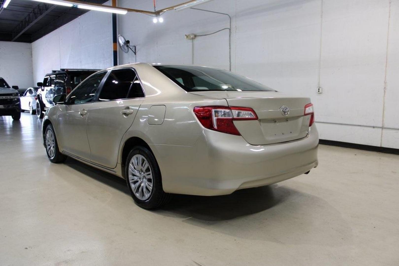 2012 Begie /Begie Toyota Camry LE (4T1BF1FK3CU) with an 2.5L I4 SMPI DOHC engine, Automatic transmission, located at 15300 Midway Rd., Addison, TX, 75001, (972) 702-0011, 32.958321, -96.838074 - HOME OF THE NO HAGGLE PRICE - WHOLESALE PRICES TO THE PUBLIC!! Camry LE, 4D Sedan, 2.5L I4 SMPI DOHC, 6-Speed Automatic, FWD, Begie, Begie Cloth. Odometer is 12022 miles below market average!<br><br>Begie 2012 Toyota Camry LE<br><br>25/35 City/Highway MPG<br><br>Awards:<br> * 2012 KBB.com Best Resa - Photo#3