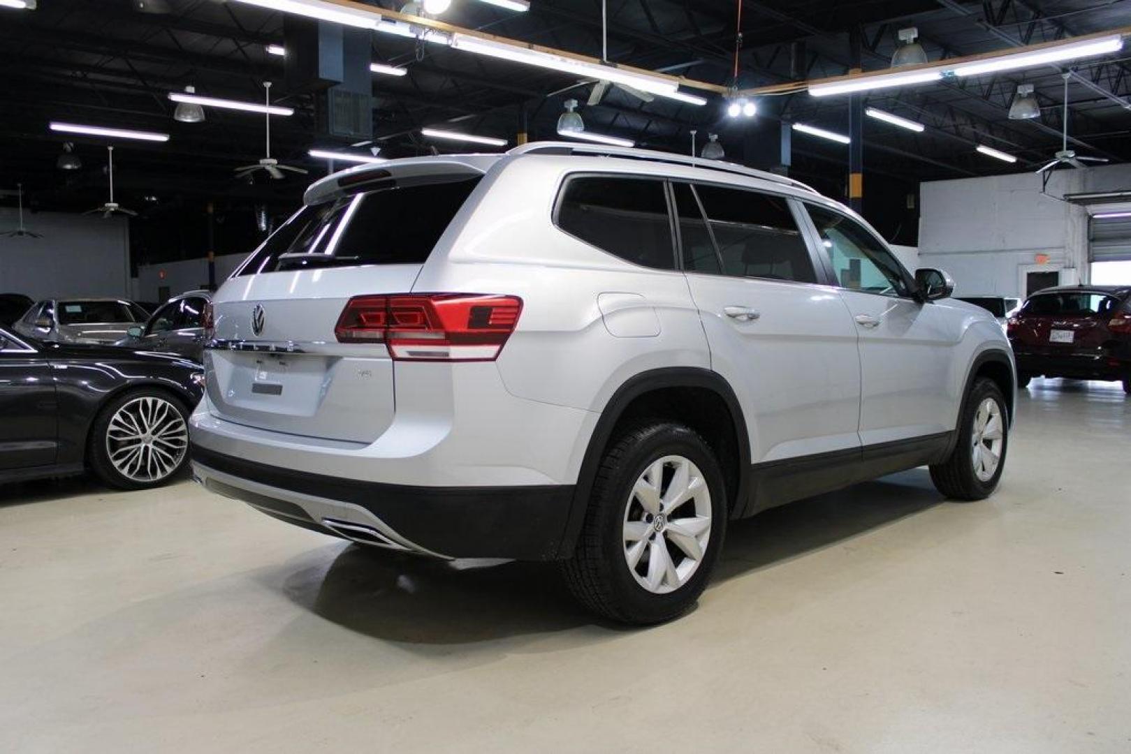 2019 Platinum Gray Metallic /Titan Black Volkswagen Atlas 3.6L V6 SE (1V2WR2CA9KC) with an 3.6L VR6 engine, Automatic transmission, located at 15300 Midway Rd., Addison, TX, 75001, (972) 702-0011, 32.958321, -96.838074 - HOME OF THE NO HAGGLE PRICE - WHOLESALE PRICES TO THE PUBLIC!! Atlas 3.6L V6 SE w/Technology, 4D Sport Utility, 3.6L VR6, 8-Speed Automatic with Tiptronic, FWD, Gray.<br><br>Gray 2019 Volkswagen Atlas 3.6L V6 SE<br><br><br>Awards:<br> * 2019 KBB.com 10 Best Road Trip Cars * 2019 KBB.com 12 Best F - Photo#2