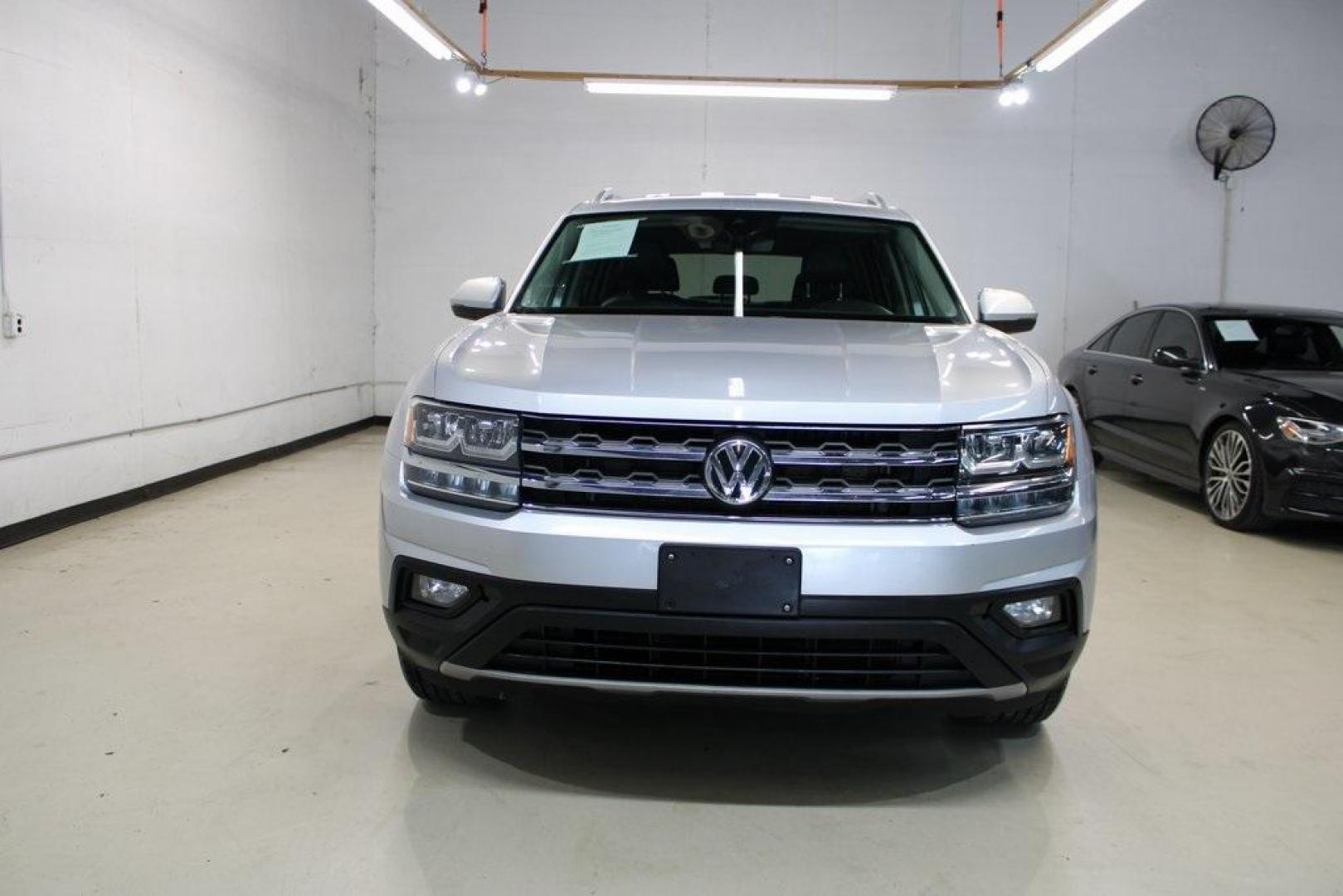 2019 Platinum Gray Metallic /Titan Black Volkswagen Atlas 3.6L V6 SE (1V2WR2CA9KC) with an 3.6L VR6 engine, Automatic transmission, located at 15300 Midway Rd., Addison, TX, 75001, (972) 702-0011, 32.958321, -96.838074 - HOME OF THE NO HAGGLE PRICE - WHOLESALE PRICES TO THE PUBLIC!! Atlas 3.6L V6 SE w/Technology, 4D Sport Utility, 3.6L VR6, 8-Speed Automatic with Tiptronic, FWD, Gray.<br><br>Gray 2019 Volkswagen Atlas 3.6L V6 SE<br><br><br>Awards:<br> * 2019 KBB.com 10 Best Road Trip Cars * 2019 KBB.com 12 Best F - Photo#5