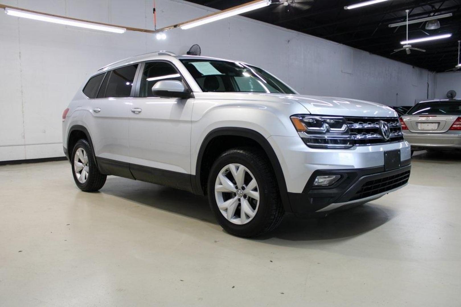 2019 Platinum Gray Metallic /Titan Black Volkswagen Atlas 3.6L V6 SE (1V2WR2CA9KC) with an 3.6L VR6 engine, Automatic transmission, located at 15300 Midway Rd., Addison, TX, 75001, (972) 702-0011, 32.958321, -96.838074 - HOME OF THE NO HAGGLE PRICE - WHOLESALE PRICES TO THE PUBLIC!! Atlas 3.6L V6 SE w/Technology, 4D Sport Utility, 3.6L VR6, 8-Speed Automatic with Tiptronic, FWD, Gray.<br><br>Gray 2019 Volkswagen Atlas 3.6L V6 SE<br><br><br>Awards:<br> * 2019 KBB.com 10 Best Road Trip Cars * 2019 KBB.com 12 Best F - Photo#6