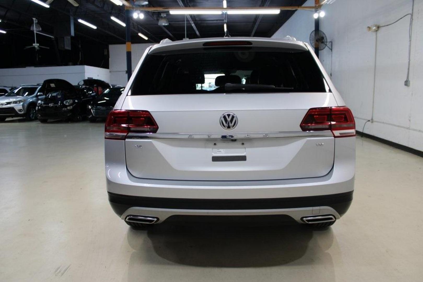 2019 Platinum Gray Metallic /Titan Black Volkswagen Atlas 3.6L V6 SE (1V2WR2CA9KC) with an 3.6L VR6 engine, Automatic transmission, located at 15300 Midway Rd., Addison, TX, 75001, (972) 702-0011, 32.958321, -96.838074 - HOME OF THE NO HAGGLE PRICE - WHOLESALE PRICES TO THE PUBLIC!! Atlas 3.6L V6 SE w/Technology, 4D Sport Utility, 3.6L VR6, 8-Speed Automatic with Tiptronic, FWD, Gray.<br><br>Gray 2019 Volkswagen Atlas 3.6L V6 SE<br><br><br>Awards:<br> * 2019 KBB.com 10 Best Road Trip Cars * 2019 KBB.com 12 Best F - Photo#7