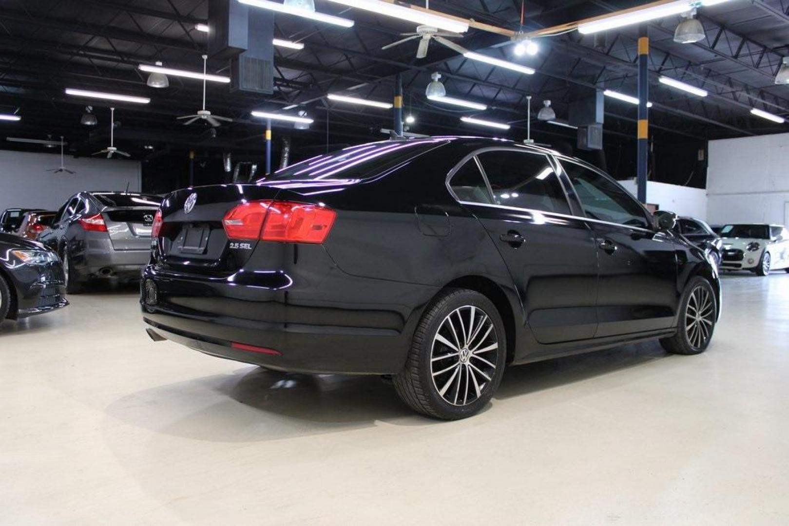 2012 Black Uni Volkswagen Jetta SEL (3VWLP7AJ2CM) with an 2.5L 5-Cylinder DOHC engine, Automatic transmission, located at 15300 Midway Rd., Addison, TX, 75001, (972) 702-0011, 32.958321, -96.838074 - Photo#2