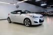 2012 Ironman Silver /Gray Hyundai Veloster Base (KMHTC6AD0CU) with an 1.6L 4-Cylinder DGI DOHC engine, Automatic transmission, located at 15300 Midway Rd., Addison, TX, 75001, (972) 702-0011, 32.958321, -96.838074 - HOME OF THE NO HAGGLE PRICE - WHOLESALE PRICES TO THE PUBLIC!! 3D Hatchback, 1.6L 4-Cylinder DGI DOHC, 6-Speed Automatic, FWD, Ironman Silver, Gray Cloth.<br><br>Ironman Silver 2012 Hyundai Veloster<br><br>27/35 City/Highway MPG<br><br>Awards:<br> * 2012 KBB.com 10 Coolest New Cars Under $18,000<br - Photo#6