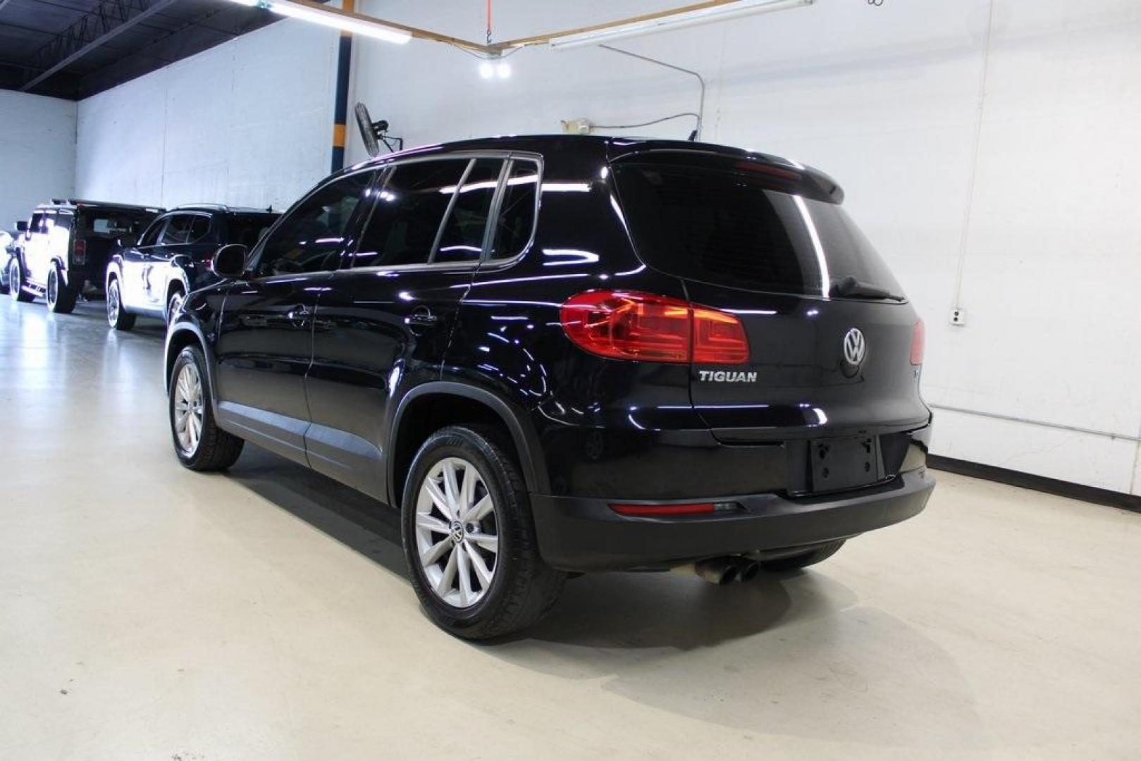 2017 Deep Black Pearl /Charcoal Black Volkswagen Tiguan 2.0T S (WVGAV7AXXHK) with an 2.0L TSI DOHC engine, Automatic transmission, located at 15300 Midway Rd., Addison, TX, 75001, (972) 702-0011, 32.958321, -96.838074 - HOME OF THE NO HAGGLE PRICE - WHOLESALE PRICES TO THE PUBLIC!! Tiguan 2.0T S, 4D Sport Utility, 2.0L TSI DOHC, 6-Speed Automatic with Tiptronic, FWD, Black.<br><br>Black 2017 Volkswagen Tiguan 2.0T S<br><br>Recent Arrival!<br><br><br>At Midway Auto Group, we strive to provide you with the best quali - Photo#3