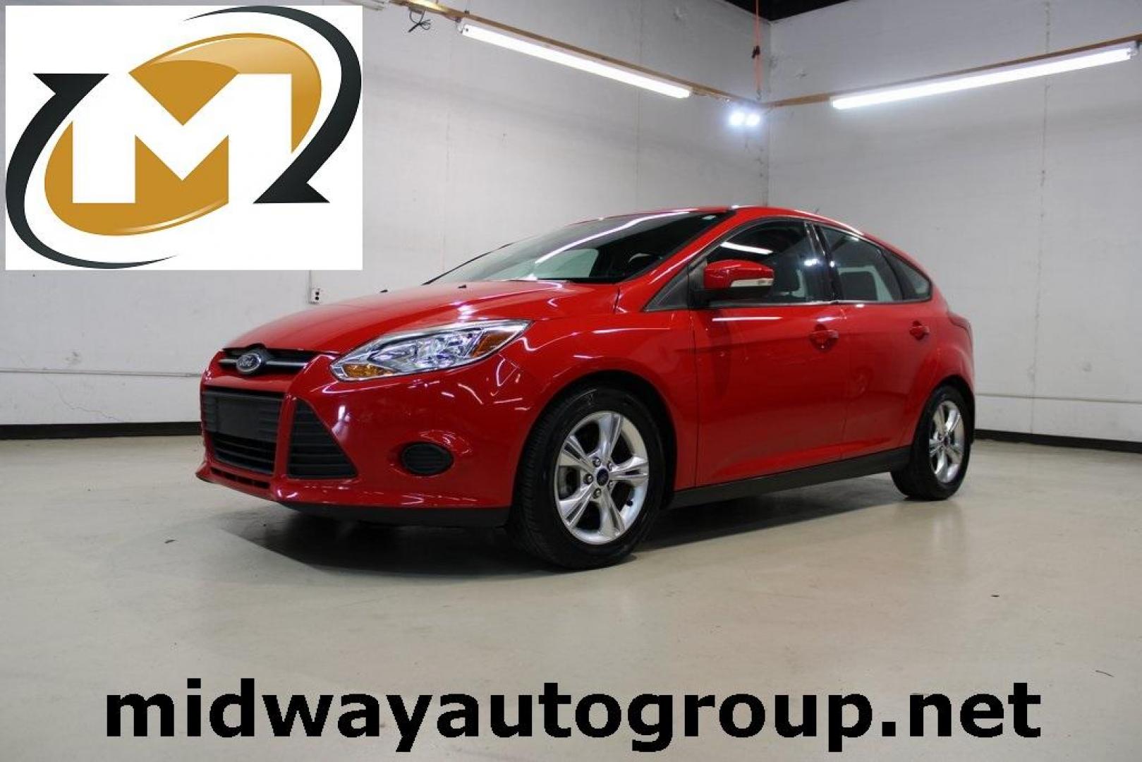 2014 Red Ford Focus SE (1FADP3K27EL) with an I4 engine, located at 15300 Midway Rd., Addison, TX, 75001, (972) 702-0011, 32.958321, -96.838074 - Photo#0