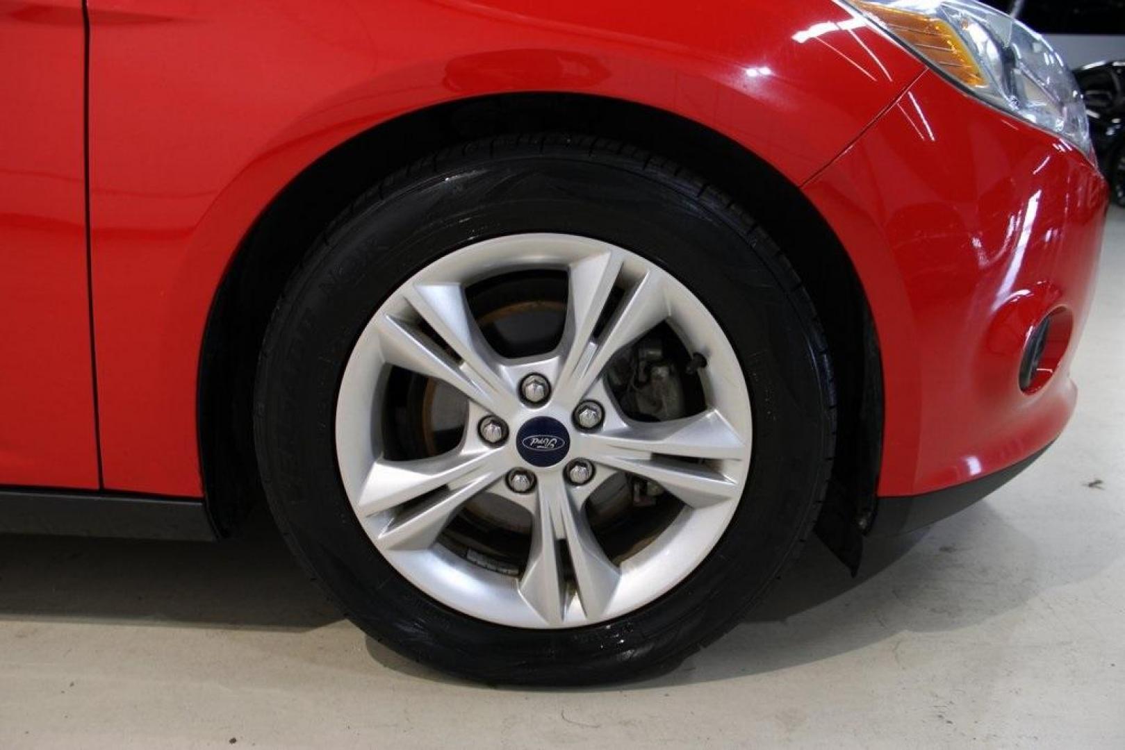 2014 Red Ford Focus SE (1FADP3K27EL) with an I4 engine, located at 15300 Midway Rd., Addison, TX, 75001, (972) 702-0011, 32.958321, -96.838074 - Photo#11