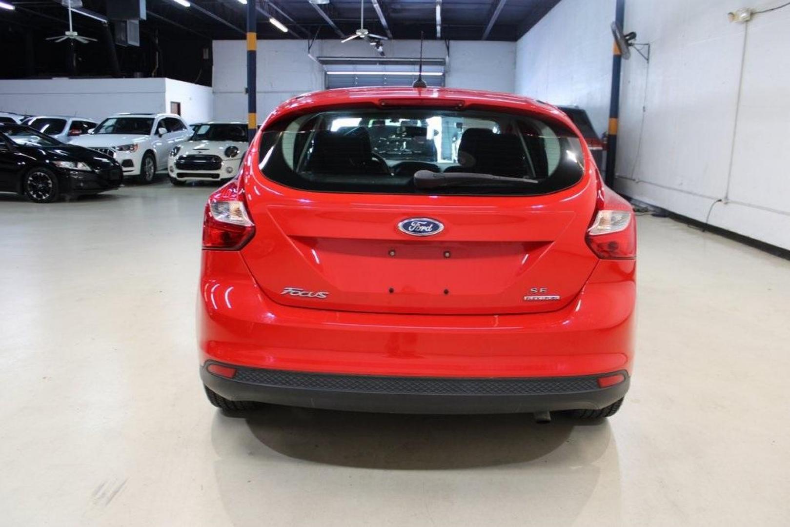 2014 Red Ford Focus SE (1FADP3K27EL) with an I4 engine, located at 15300 Midway Rd., Addison, TX, 75001, (972) 702-0011, 32.958321, -96.838074 - Photo#7