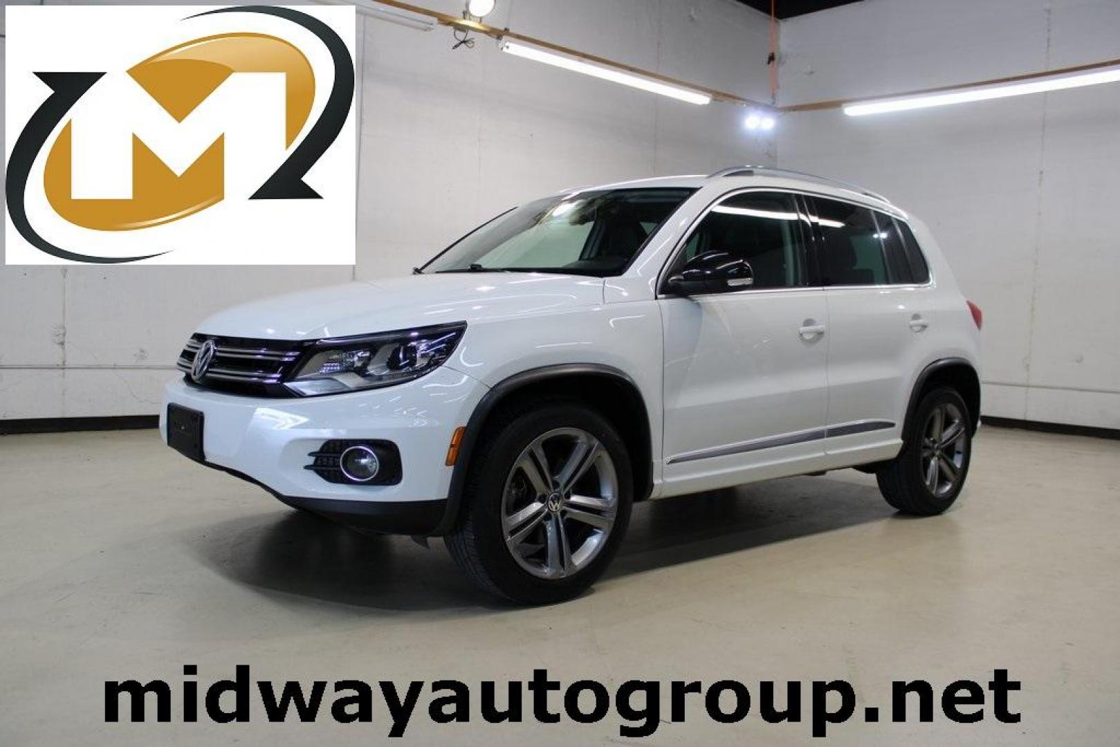 2017 Pure White Volkswagen Tiguan Sport (WVGTV7AX6HK) with an 2.0L TSI DOHC engine, Automatic transmission, located at 15300 Midway Rd., Addison, TX, 75001, (972) 702-0011, 32.958321, -96.838074 - Photo#0