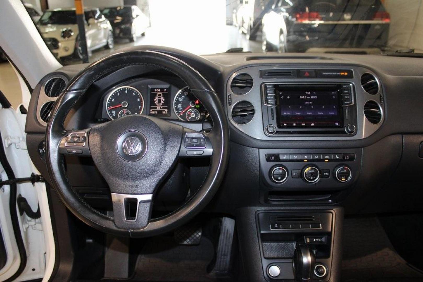 2017 Pure White Volkswagen Tiguan Sport (WVGTV7AX6HK) with an 2.0L TSI DOHC engine, Automatic transmission, located at 15300 Midway Rd., Addison, TX, 75001, (972) 702-0011, 32.958321, -96.838074 - Photo#16