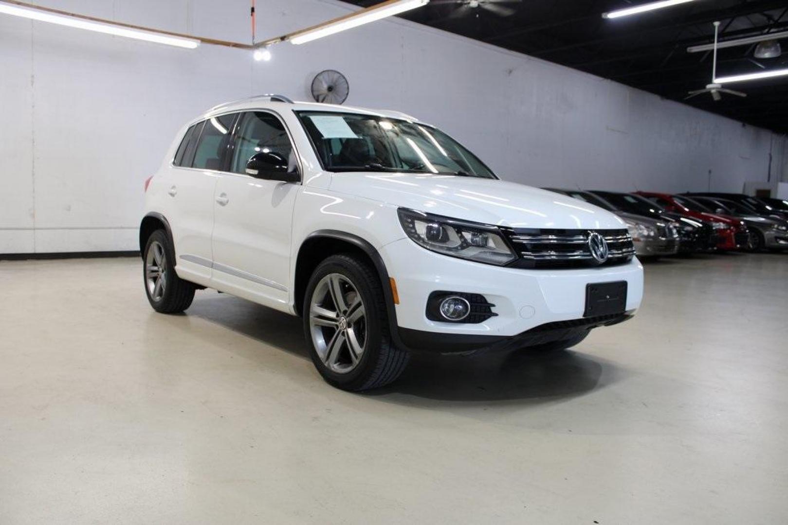 2017 Pure White Volkswagen Tiguan Sport (WVGTV7AX6HK) with an 2.0L TSI DOHC engine, Automatic transmission, located at 15300 Midway Rd., Addison, TX, 75001, (972) 702-0011, 32.958321, -96.838074 - Photo#1