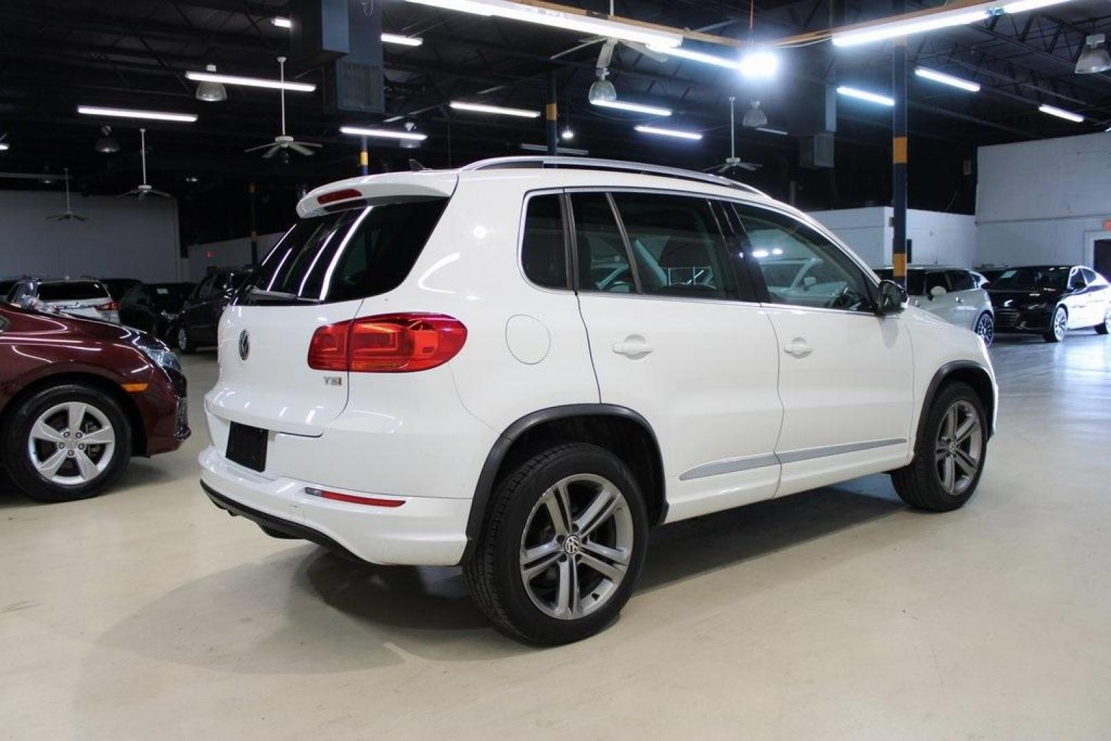 2017 Pure White Volkswagen Tiguan Sport (WVGTV7AX6HK) with an 2.0L TSI DOHC engine, Automatic transmission, located at 15300 Midway Rd., Addison, TX, 75001, (972) 702-0011, 32.958321, -96.838074 - Photo#2