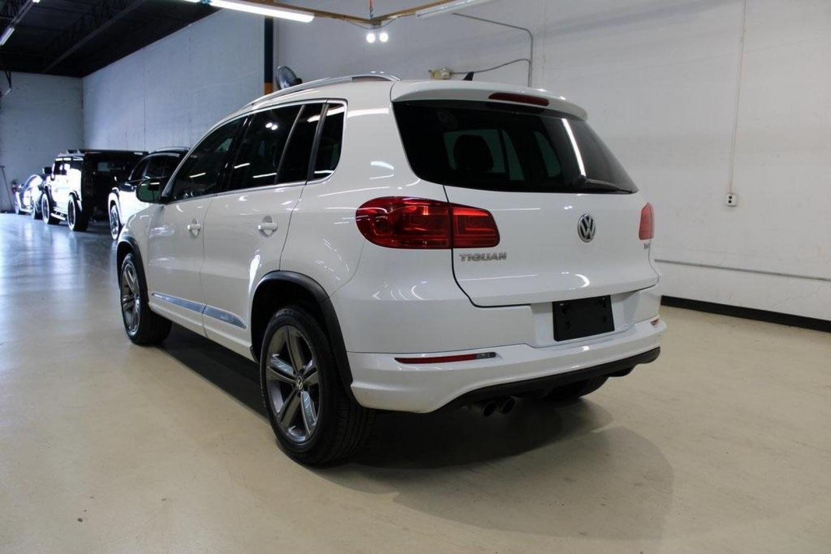 2017 Pure White Volkswagen Tiguan Sport (WVGTV7AX6HK) with an 2.0L TSI DOHC engine, Automatic transmission, located at 15300 Midway Rd., Addison, TX, 75001, (972) 702-0011, 32.958321, -96.838074 - Photo#3