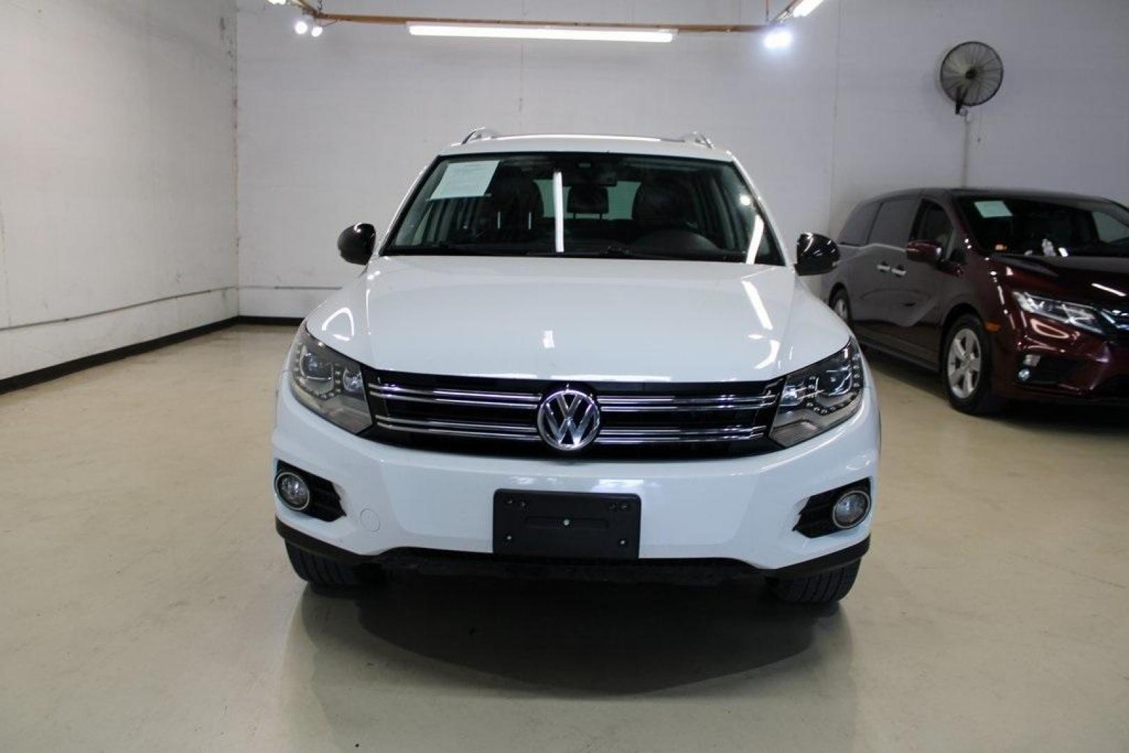 2017 Pure White Volkswagen Tiguan Sport (WVGTV7AX6HK) with an 2.0L TSI DOHC engine, Automatic transmission, located at 15300 Midway Rd., Addison, TX, 75001, (972) 702-0011, 32.958321, -96.838074 - Photo#5