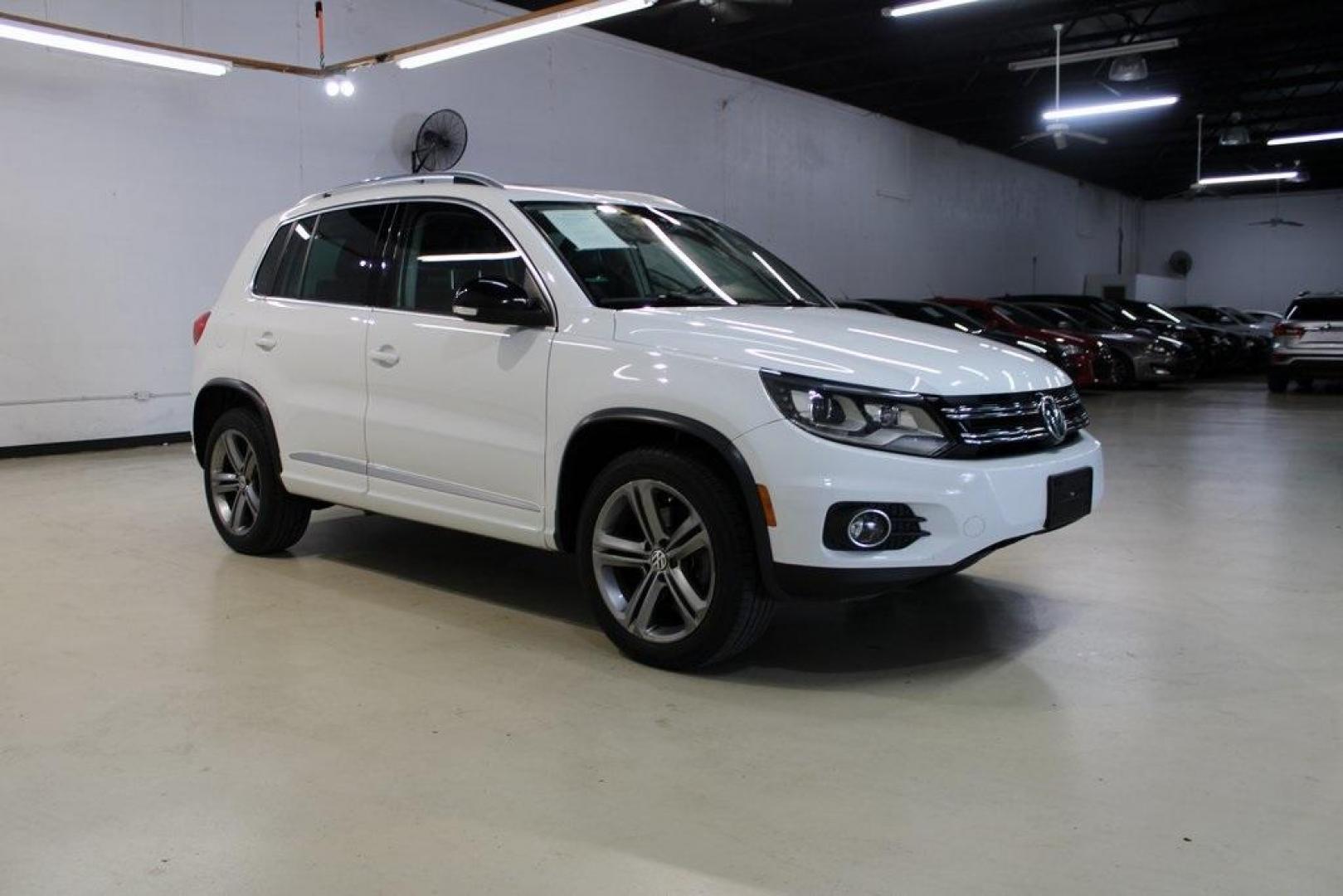 2017 Pure White Volkswagen Tiguan Sport (WVGTV7AX6HK) with an 2.0L TSI DOHC engine, Automatic transmission, located at 15300 Midway Rd., Addison, TX, 75001, (972) 702-0011, 32.958321, -96.838074 - Photo#6