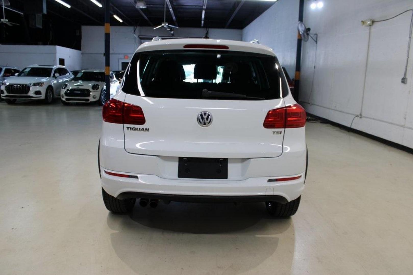 2017 Pure White Volkswagen Tiguan Sport (WVGTV7AX6HK) with an 2.0L TSI DOHC engine, Automatic transmission, located at 15300 Midway Rd., Addison, TX, 75001, (972) 702-0011, 32.958321, -96.838074 - Photo#7