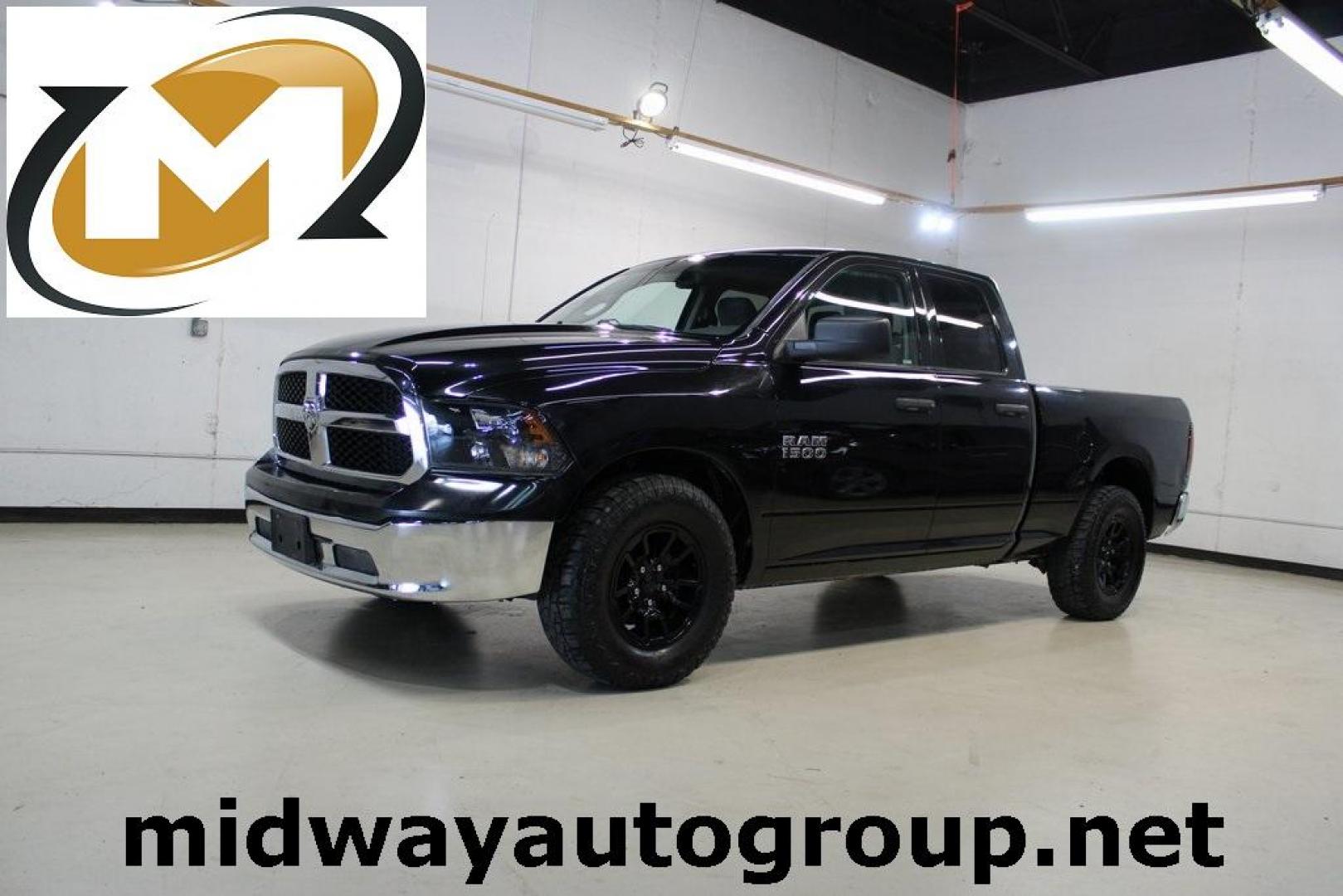 2018 Brilliant Black Crystal Pearlcoat /Black Ram 1500 Tradesman (1C6RR6FG3JS) with an 3.6L V6 24V VVT engine, Automatic transmission, located at 15300 Midway Rd., Addison, TX, 75001, (972) 702-0011, 32.958321, -96.838074 - HOME OF THE NO HAGGLE PRICE - WHOLESALE PRICES TO THE PUBLIC!! 1500 Tradesman, 4D Quad Cab, 3.6L V6 24V VVT, 8-Speed Automatic, RWD, Brilliant Black Crystal Pearlcoat, Black Cloth.<br><br>Brilliant Black Crystal Pearlcoat 2018 Ram 1500 Tradesman<br><br><br>At Midway Auto Group, we strive to provide - Photo#0