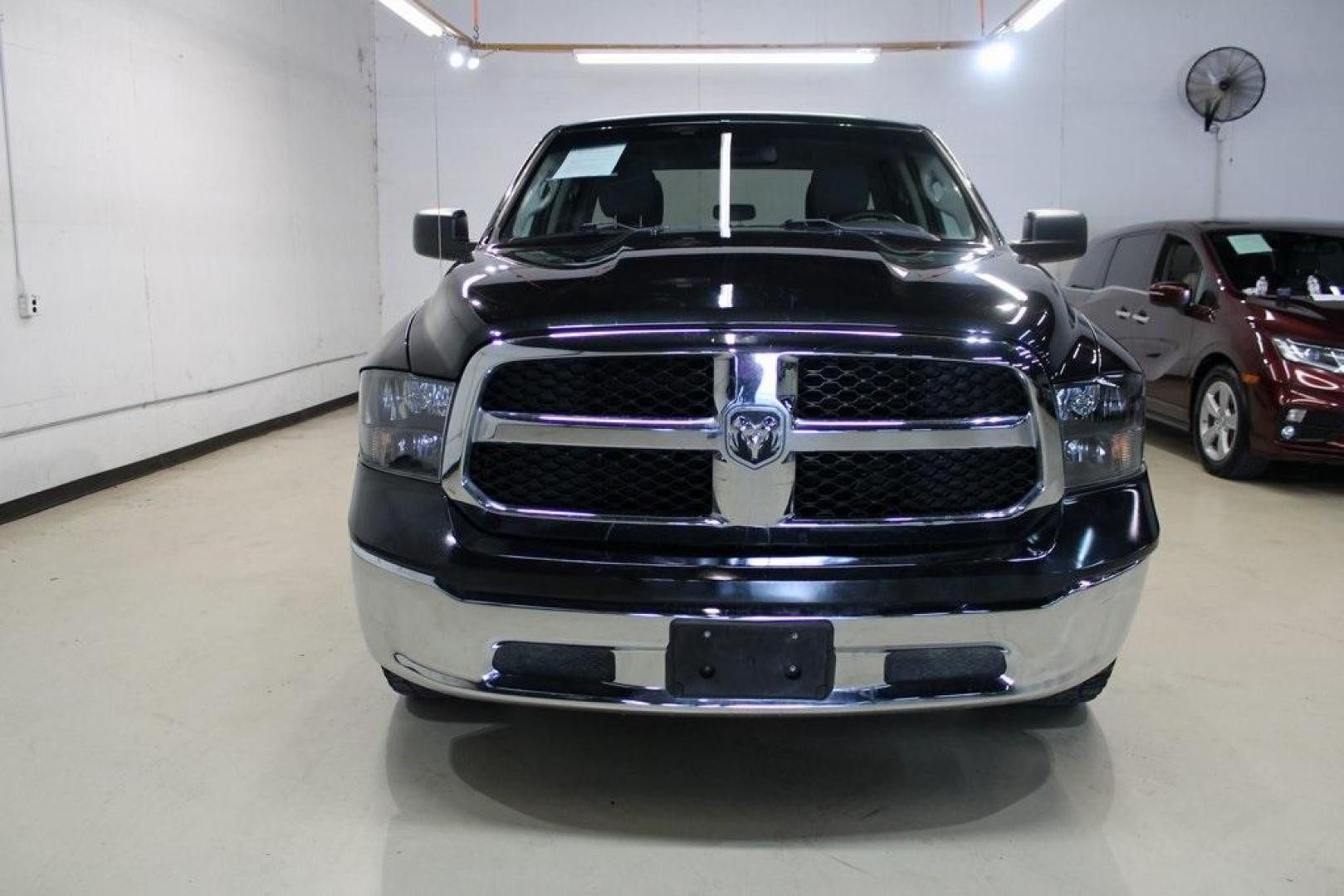 2018 Brilliant Black Crystal Pearlcoat /Black Ram 1500 Tradesman (1C6RR6FG3JS) with an 3.6L V6 24V VVT engine, Automatic transmission, located at 15300 Midway Rd., Addison, TX, 75001, (972) 702-0011, 32.958321, -96.838074 - HOME OF THE NO HAGGLE PRICE - WHOLESALE PRICES TO THE PUBLIC!! 1500 Tradesman, 4D Quad Cab, 3.6L V6 24V VVT, 8-Speed Automatic, RWD, Brilliant Black Crystal Pearlcoat, Black Cloth.<br><br>Brilliant Black Crystal Pearlcoat 2018 Ram 1500 Tradesman<br><br><br>At Midway Auto Group, we strive to provide - Photo#5