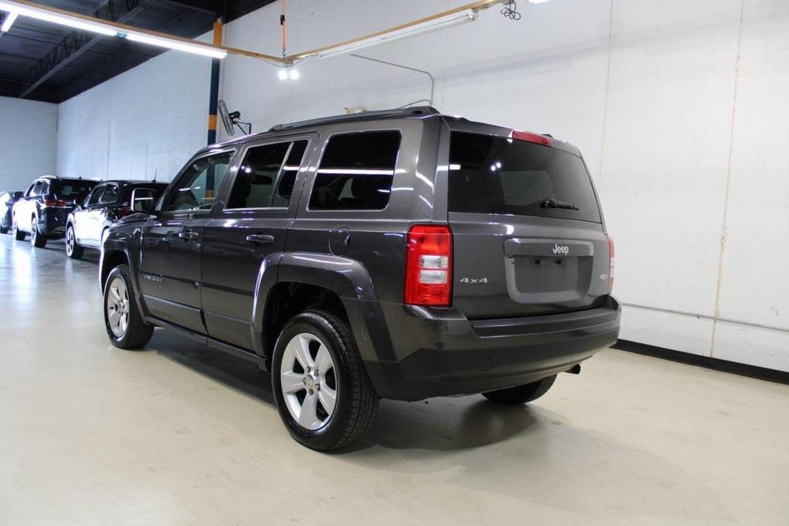 2016 Granite Crystal Metallic Clearcoat /Dark Slate Gray Jeep Patriot Latitude (1C4NJRFBXGD) with an 2.4L I4 DOHC 16V Dual VVT engine, Automatic transmission, located at 15300 Midway Rd., Addison, TX, 75001, (972) 702-0011, 32.958321, -96.838074 - Photo#2