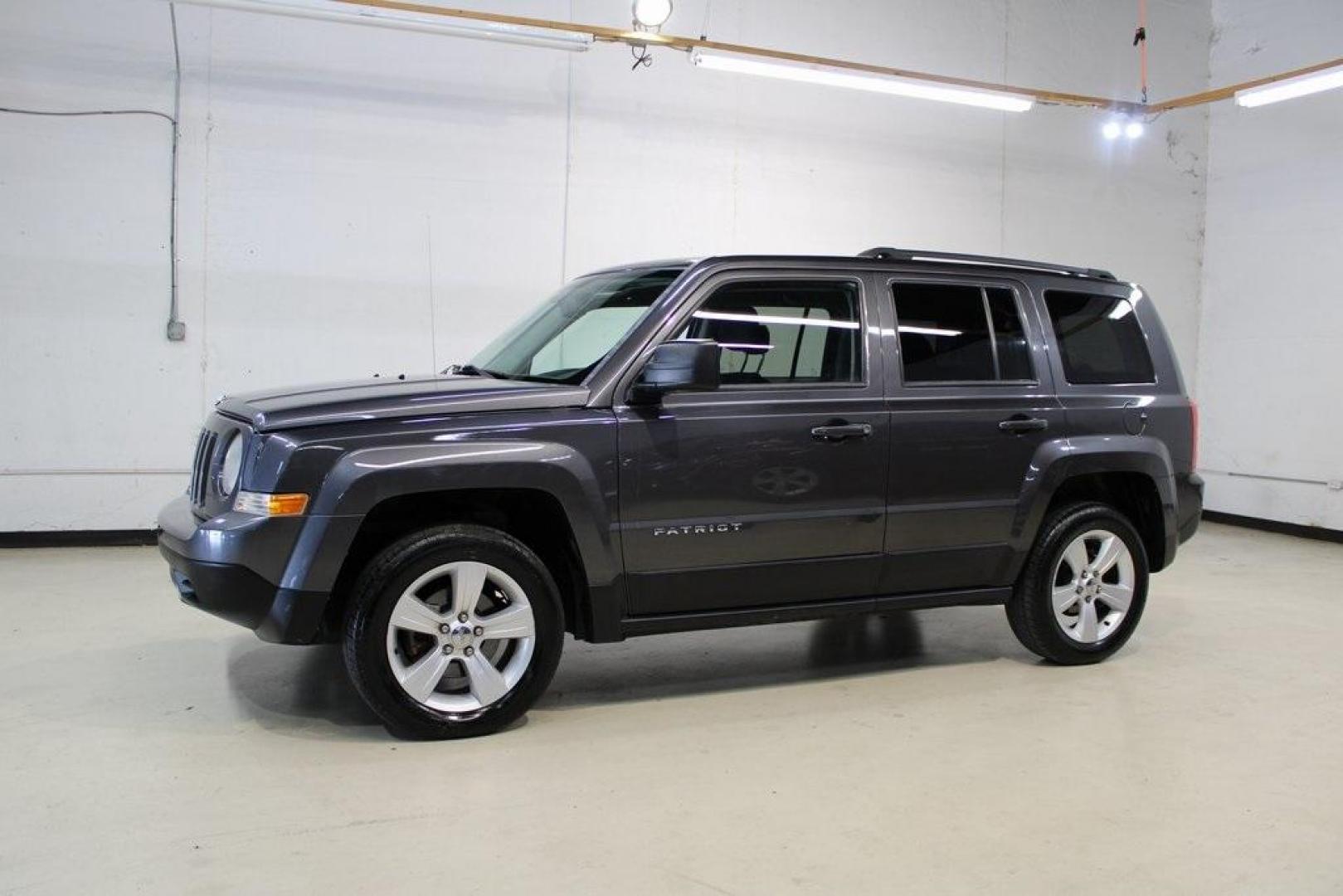 2016 Granite Crystal Metallic Clearcoat /Dark Slate Gray Jeep Patriot Latitude (1C4NJRFBXGD) with an 2.4L I4 DOHC 16V Dual VVT engine, Automatic transmission, located at 15300 Midway Rd., Addison, TX, 75001, (972) 702-0011, 32.958321, -96.838074 - Photo#3