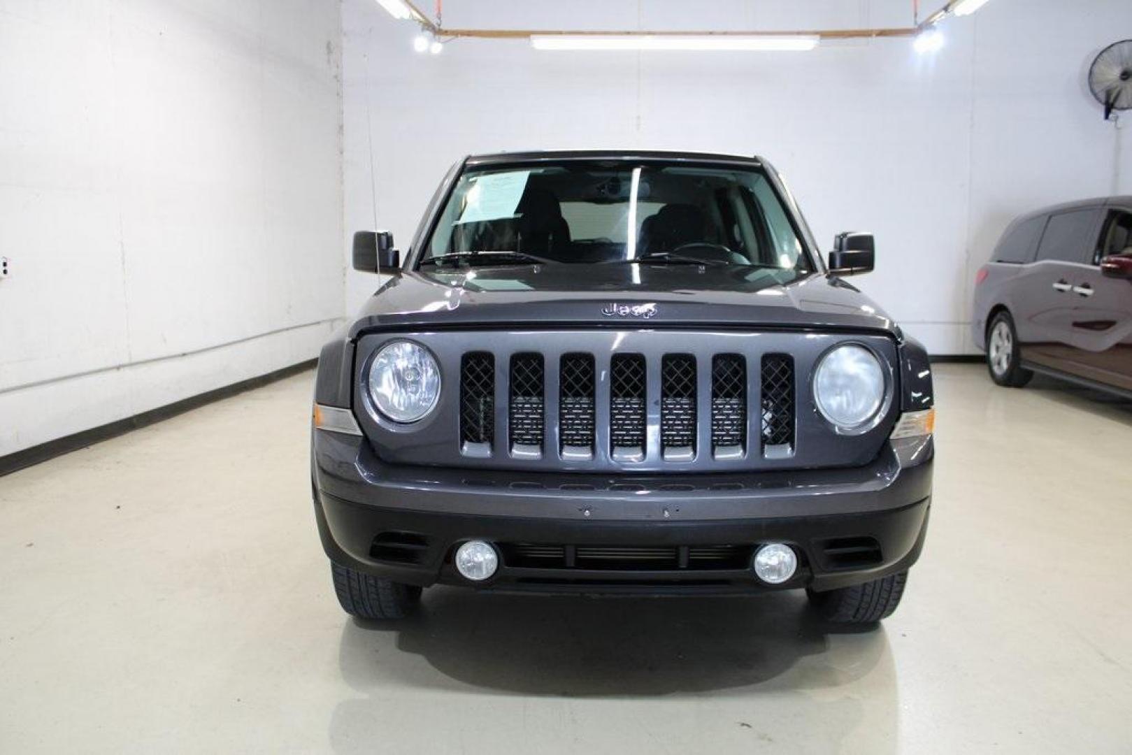 2016 Granite Crystal Metallic Clearcoat /Dark Slate Gray Jeep Patriot Latitude (1C4NJRFBXGD) with an 2.4L I4 DOHC 16V Dual VVT engine, Automatic transmission, located at 15300 Midway Rd., Addison, TX, 75001, (972) 702-0011, 32.958321, -96.838074 - Photo#4