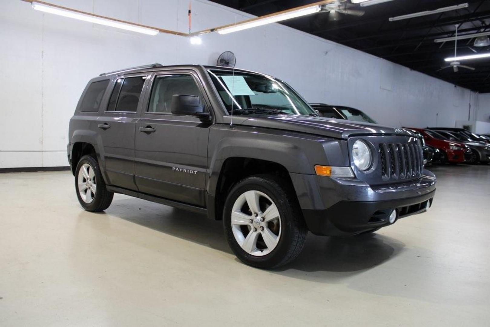 2016 Granite Crystal Metallic Clearcoat /Dark Slate Gray Jeep Patriot Latitude (1C4NJRFBXGD) with an 2.4L I4 DOHC 16V Dual VVT engine, Automatic transmission, located at 15300 Midway Rd., Addison, TX, 75001, (972) 702-0011, 32.958321, -96.838074 - Photo#5