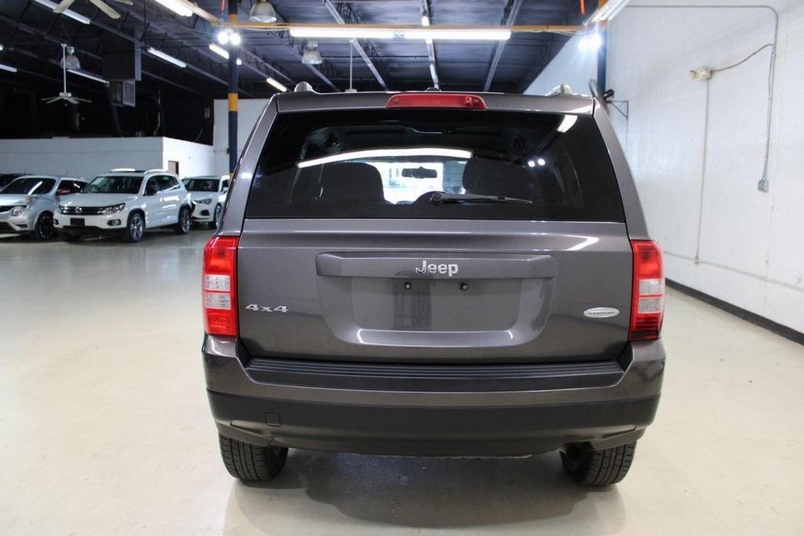 2016 Granite Crystal Metallic Clearcoat /Dark Slate Gray Jeep Patriot Latitude (1C4NJRFBXGD) with an 2.4L I4 DOHC 16V Dual VVT engine, Automatic transmission, located at 15300 Midway Rd., Addison, TX, 75001, (972) 702-0011, 32.958321, -96.838074 - Photo#6