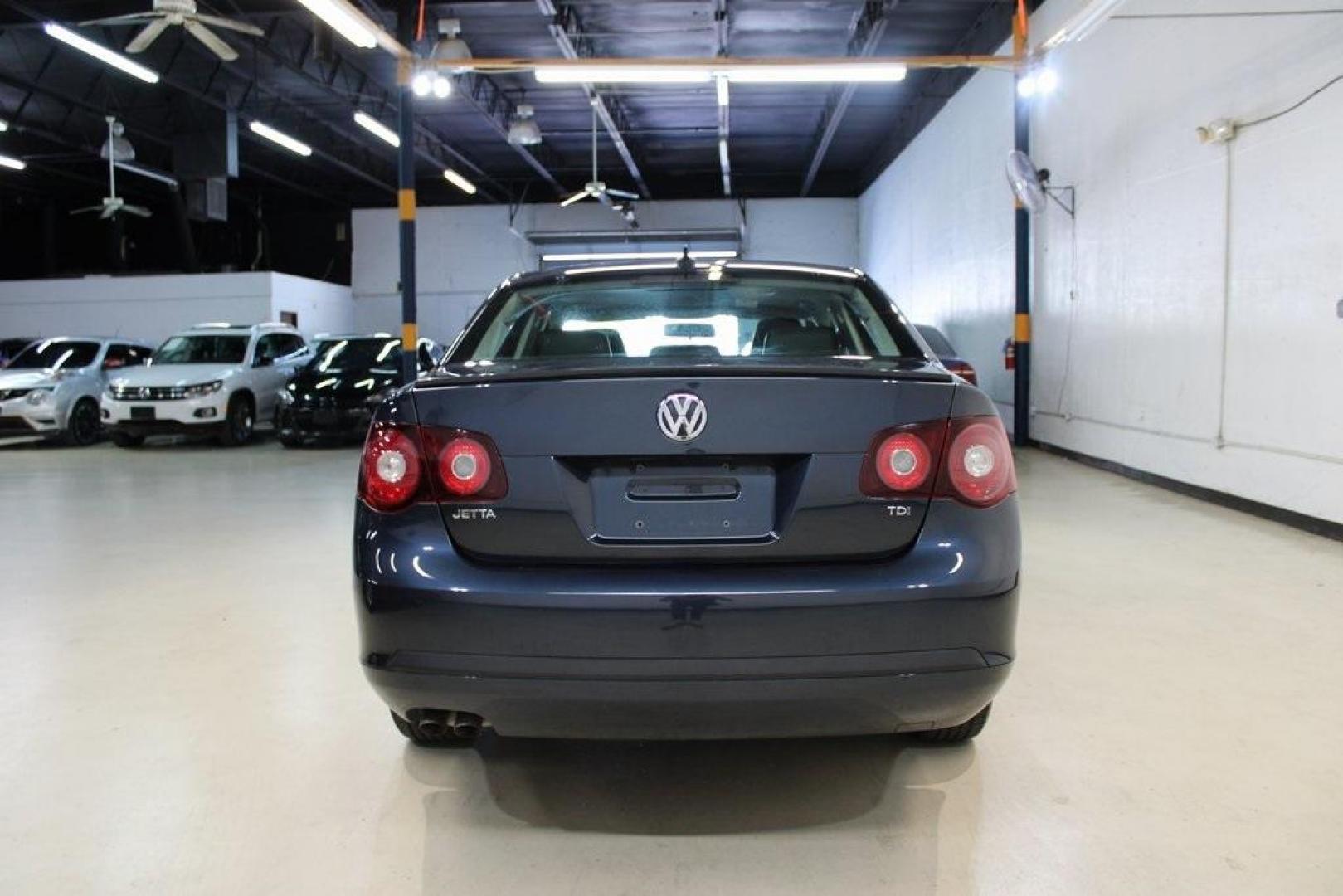 2010 Blue Volkswagen Jetta TDI (3VWAL7AJ1AM) with an 2.0L TDI Turbocharged engine, located at 15300 Midway Rd., Addison, TX, 75001, (972) 702-0011, 32.958321, -96.838074 - Photo#7